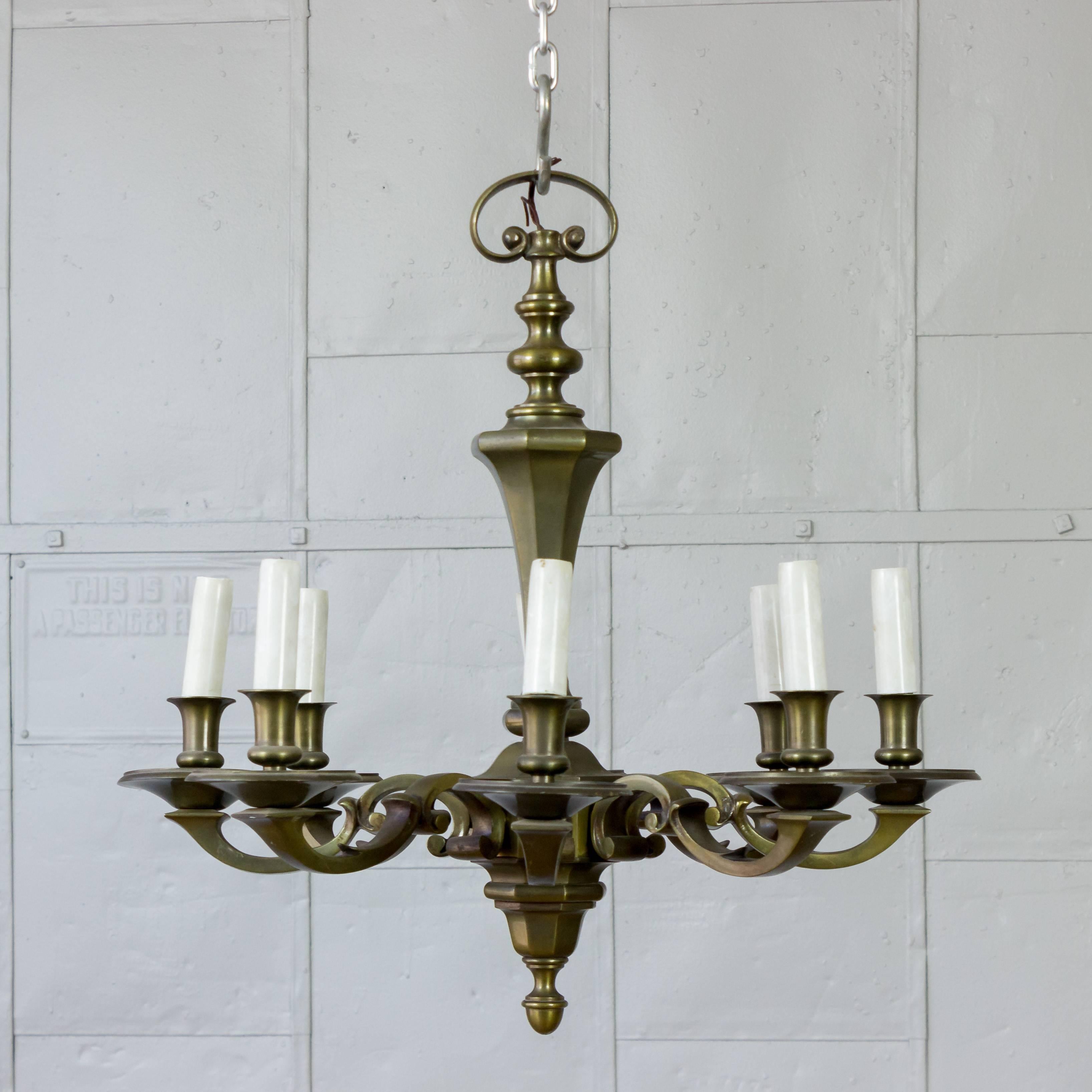 Eight arm bronze chandelier in very good condition. French, 1940s. Price includes new wiring.