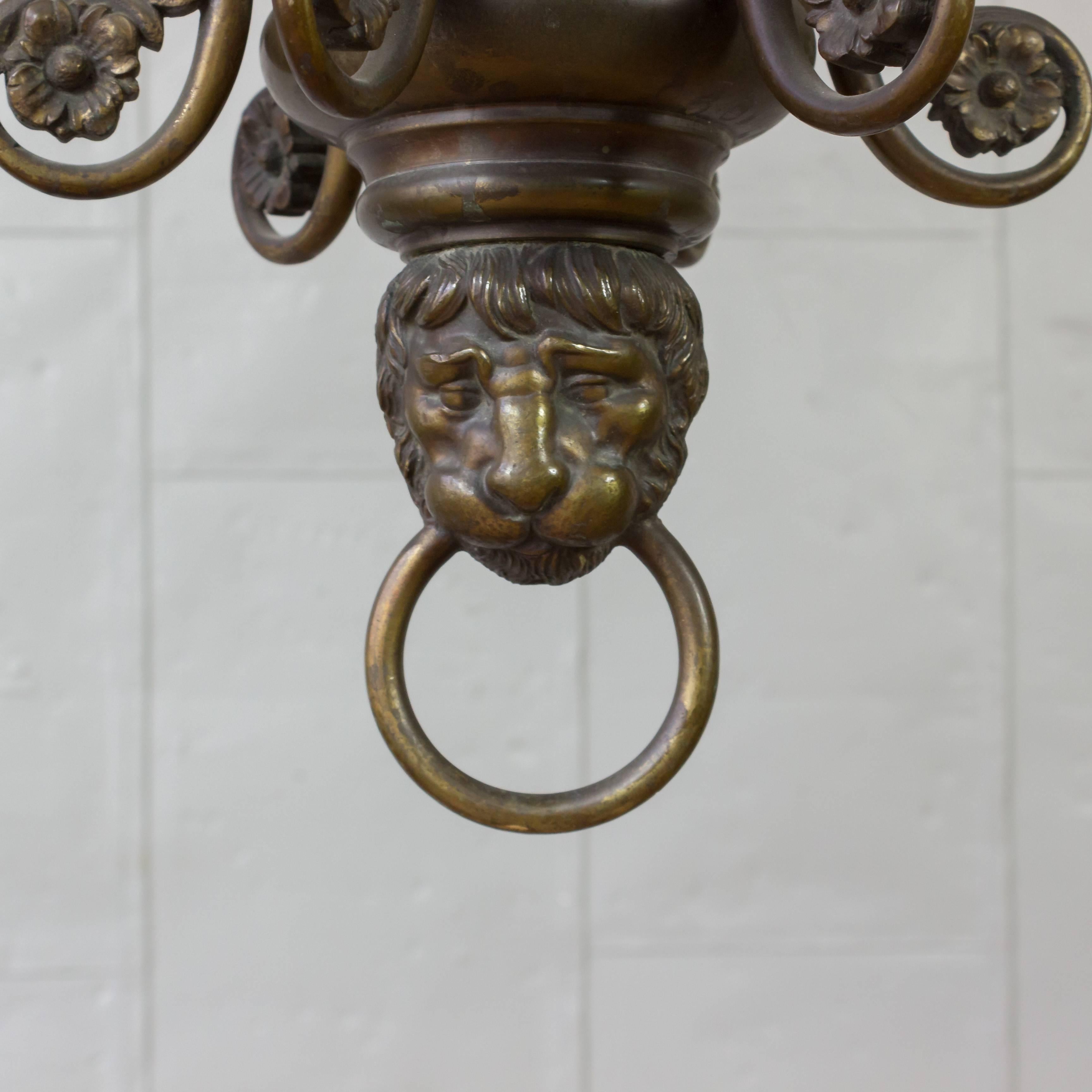 Neoclassical French Bronze Two-Tiered Chandelier with Lion Motif