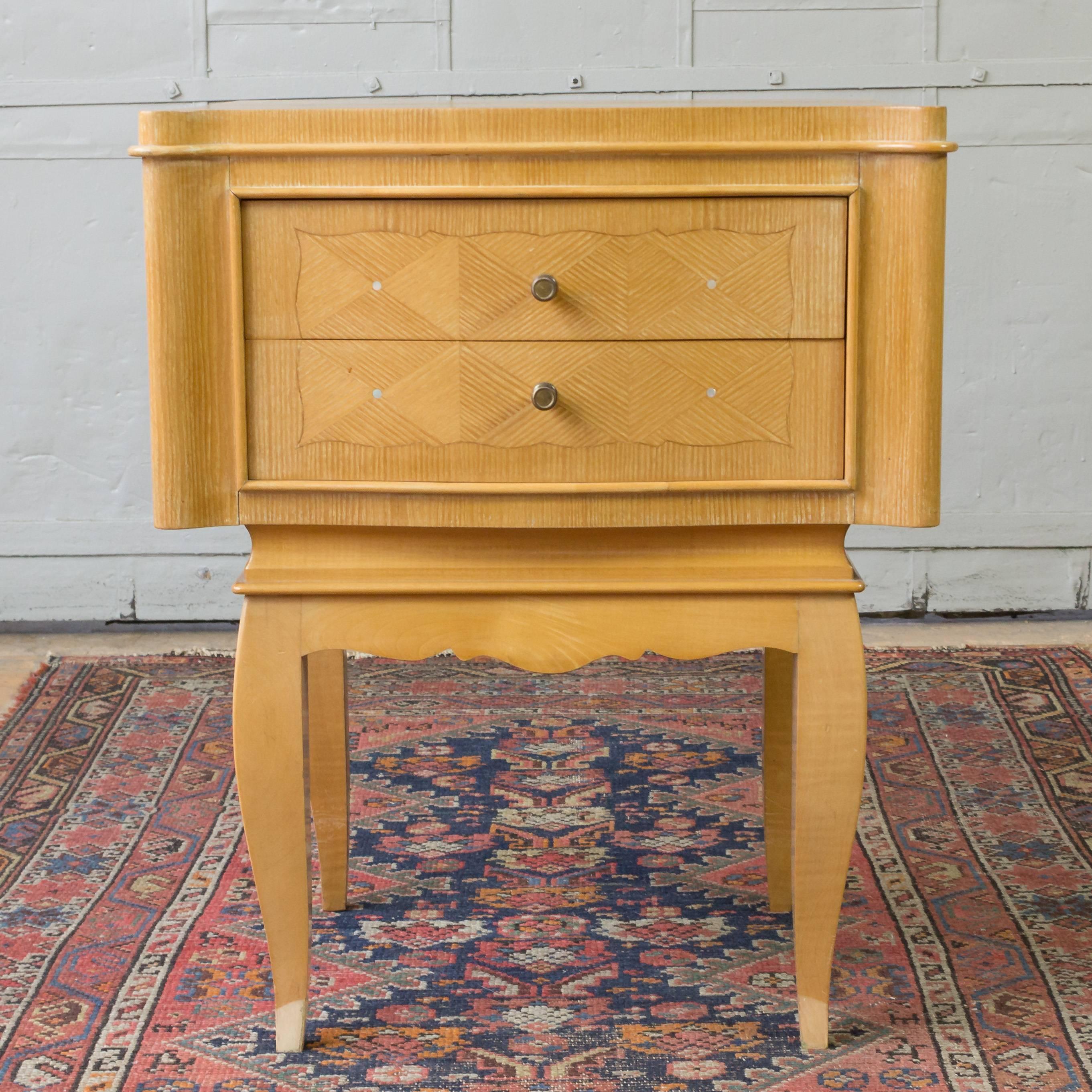 Pair of French 1940s night tables in cherry with marquetry, nightstands could be polished. Sold as is.