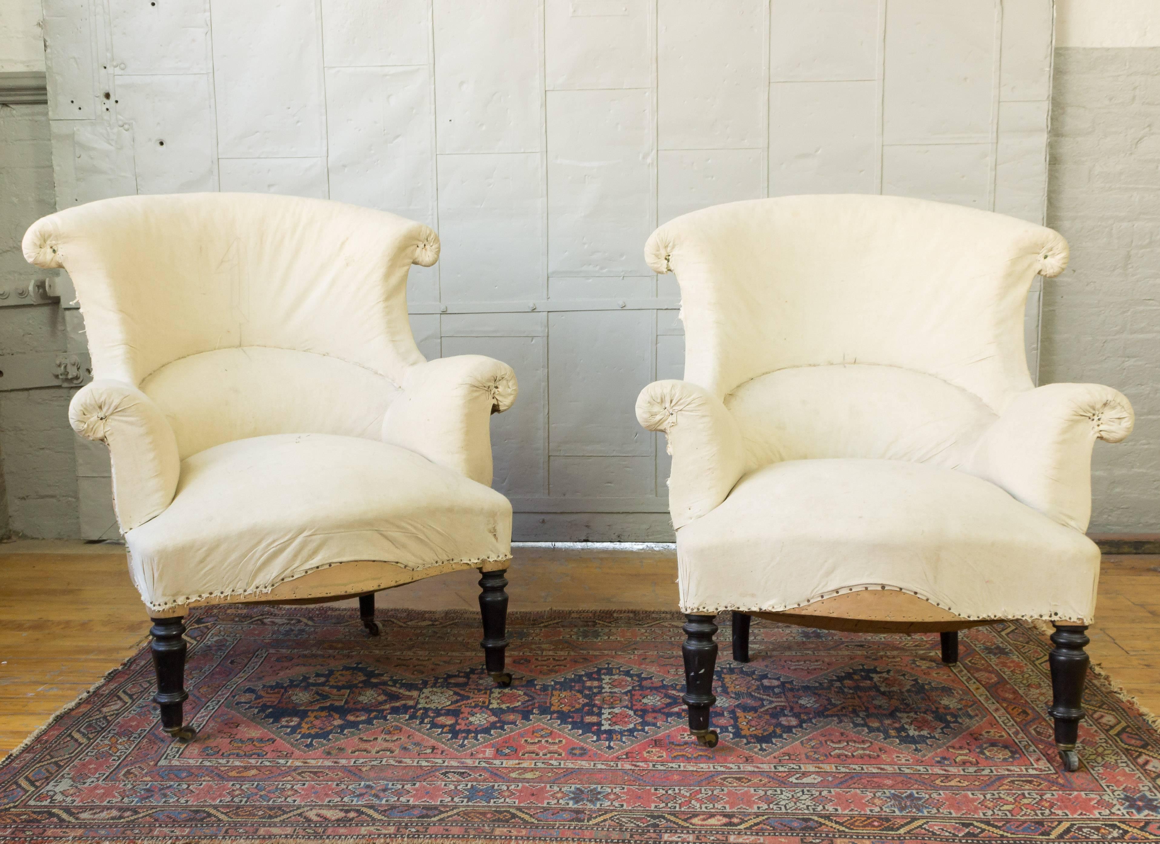 Pair of French 19th century, Napoleon III round and scroll back armchairs. Please contact for upholstery option.