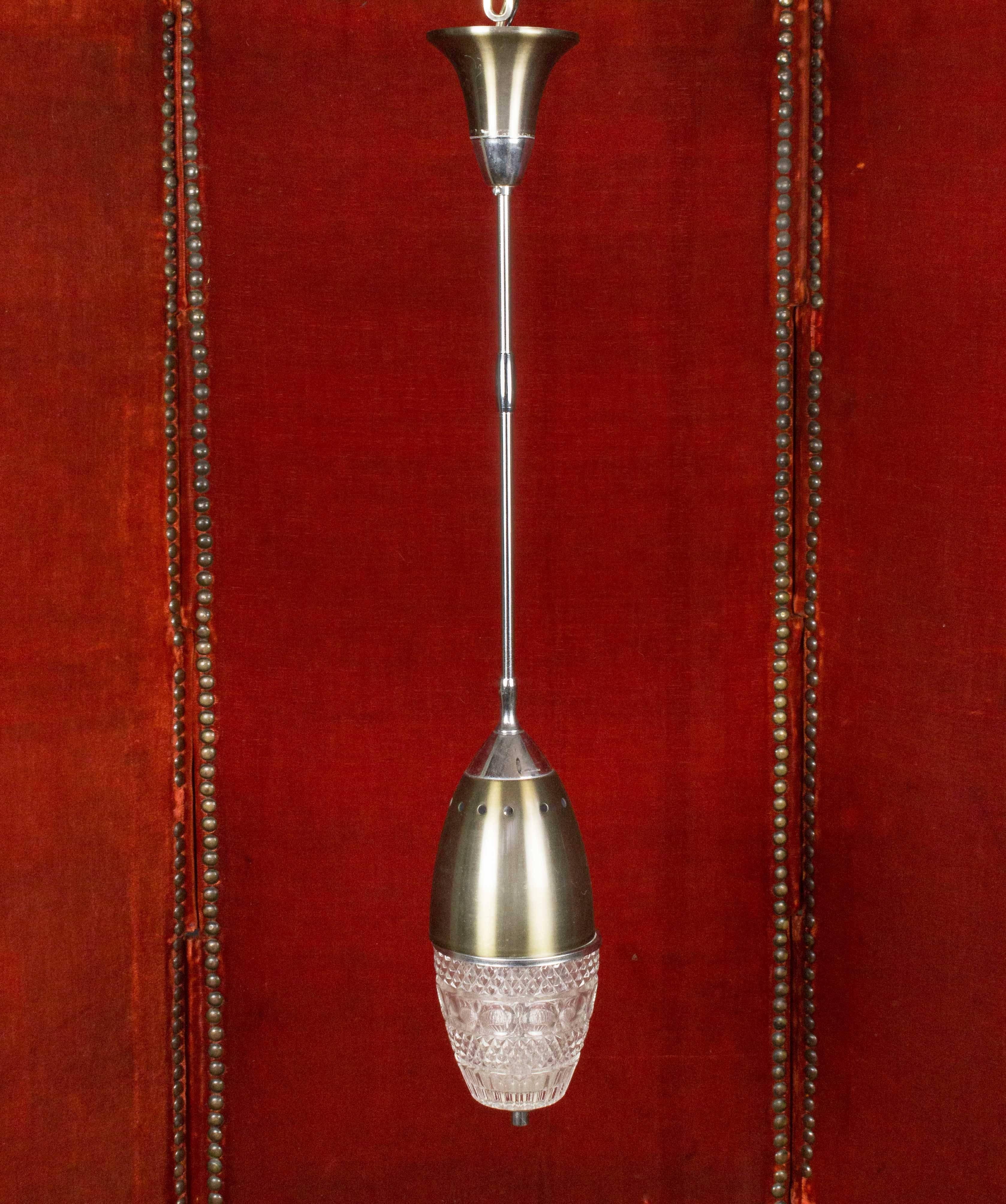 A unique pair of Italian glass and stainless steel hanging pendants, circa 1960. Instantly elevate the style of any room with this gorgeous pair of hanging pendants. Expertly designed to be eye-catching as well as durable, these hanging pendants are