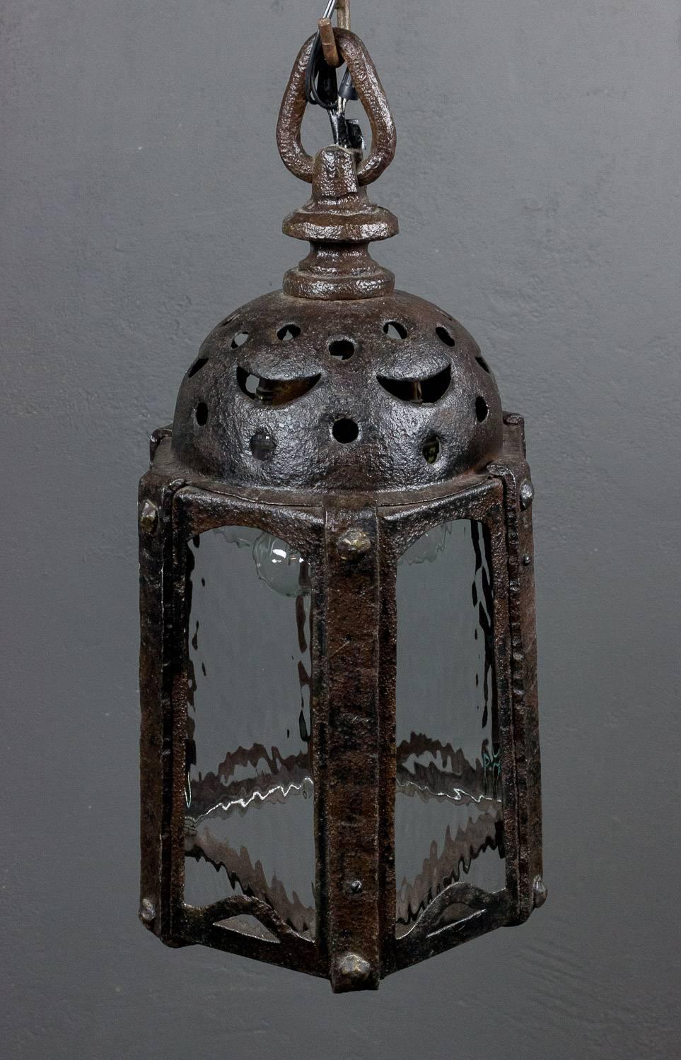 French 1920s wrought iron lantern with Moorish detail and textured glass.
Measures: 25