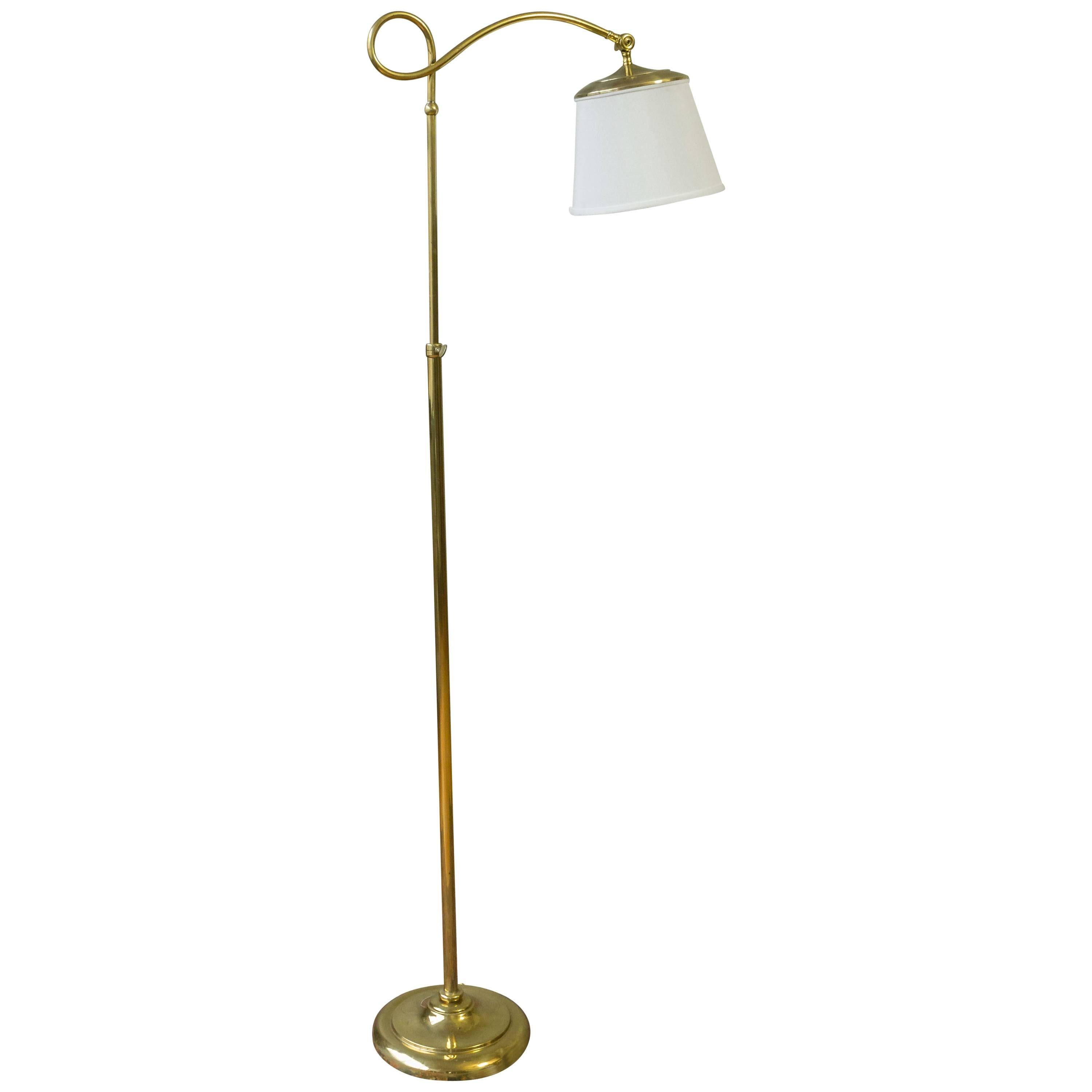 Adjustable Brass Reading Floor Lamp with a Round Base