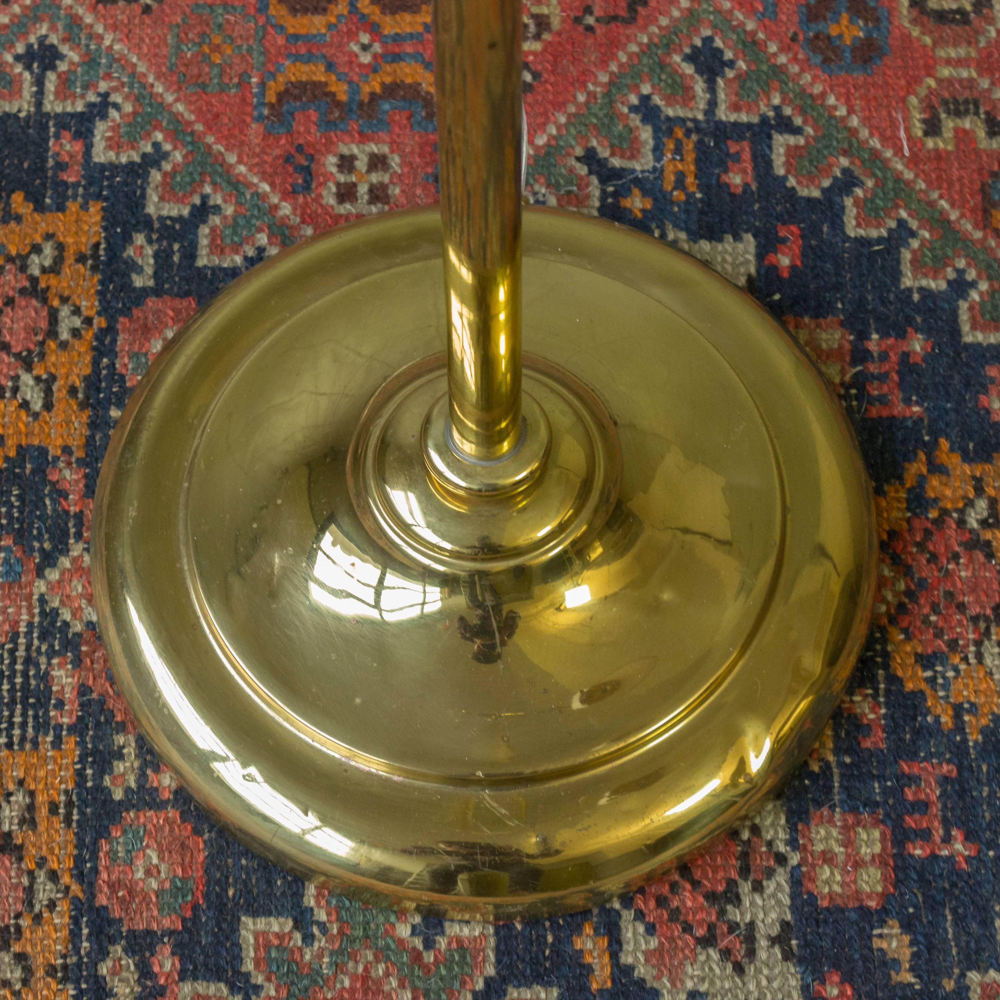 Mid-20th Century Adjustable Brass Reading Floor Lamp with a Round Base