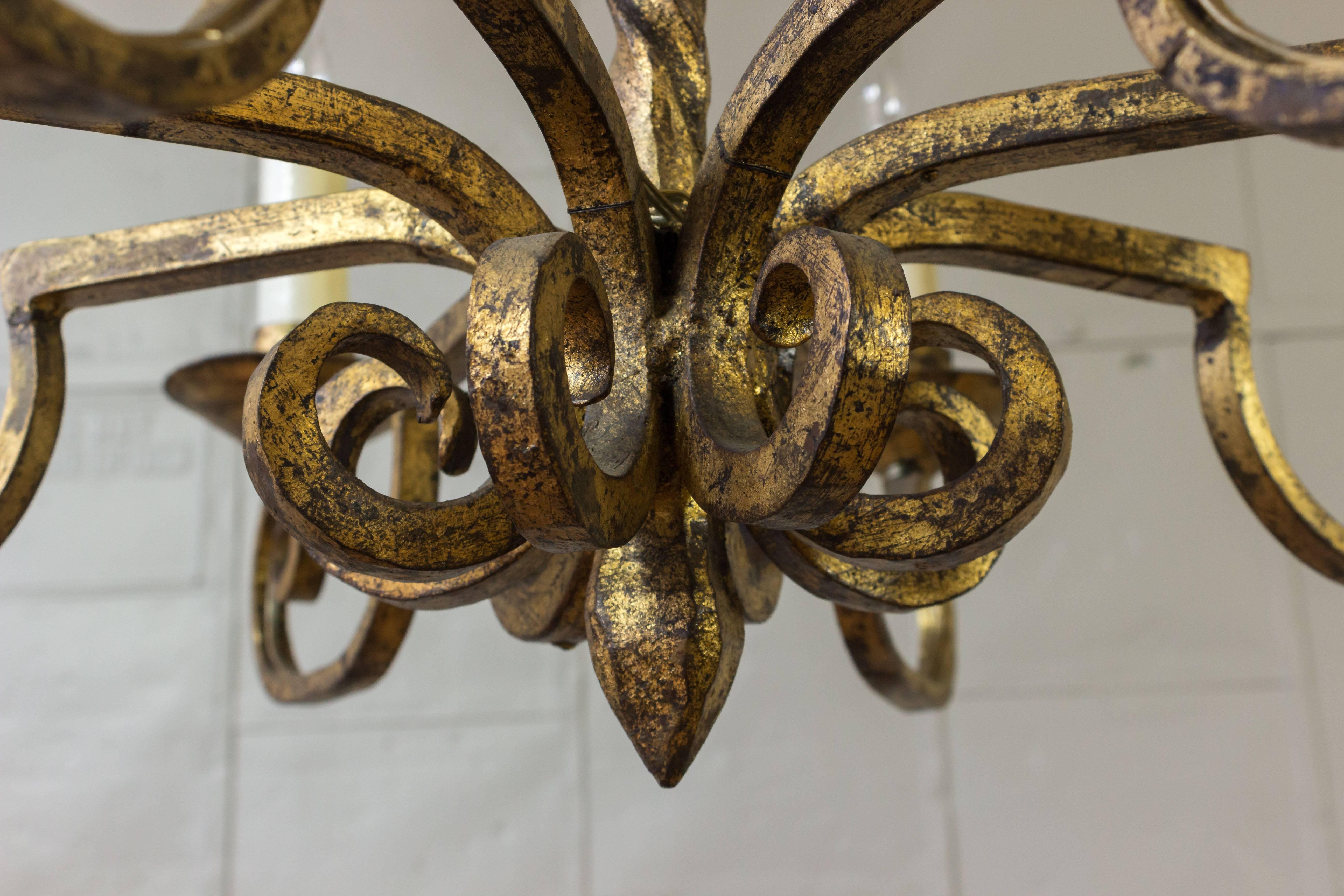 20th Century Spanish Gilt Iron Eight-Armed Chandelier with Twisted Metal Stem