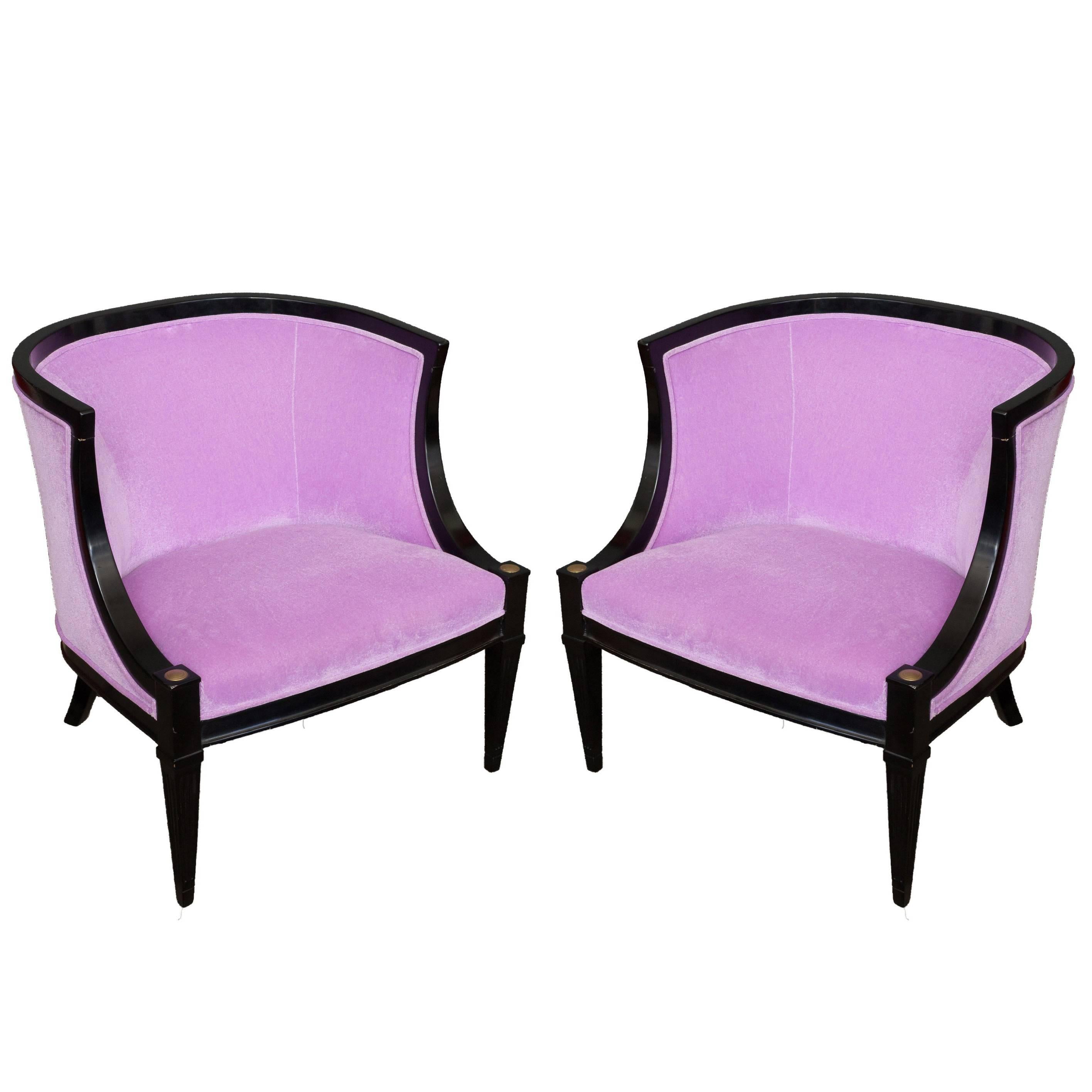 A stunning pair of American 1950s mid century armchairs in lavender velvet. Experience true luxury and elegance with this magnificent pair of rounded back armchairs. Handcrafted in American mid century 50s style, they have been recently ebonized,