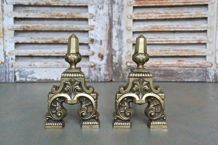 Pair of highly decorative French mid century brass and bronze andirons. Good vintage condition.

Ref #: D0810-03

Dimensions: 11