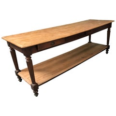 Grande table à tiroirs en orme du 19ème siècle français