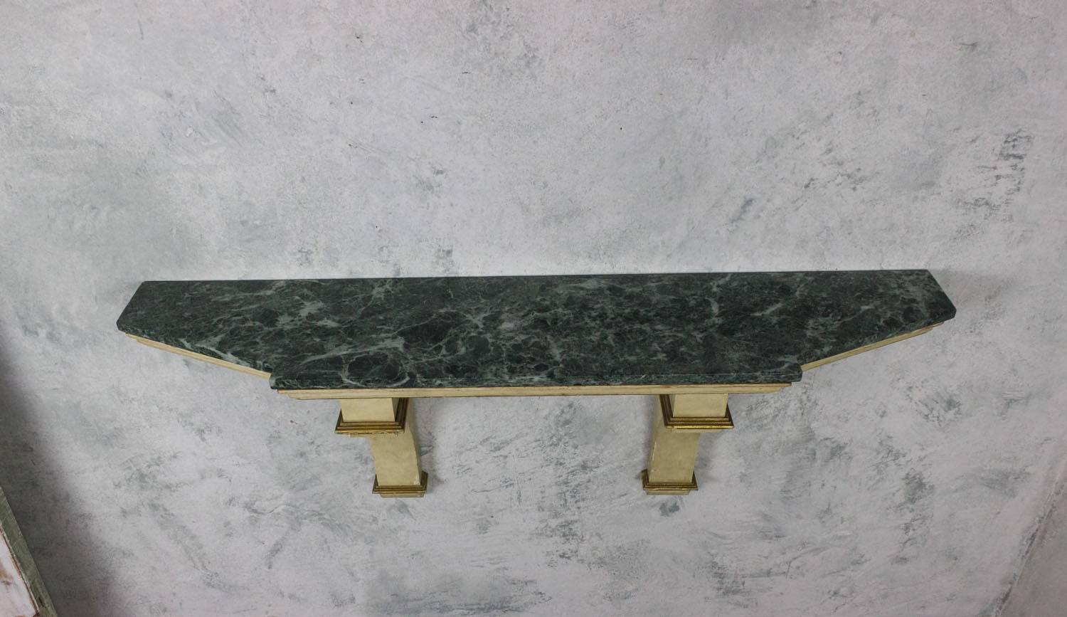 Elegant console with green marble top, white painted with gilt accents, French, 1950s.