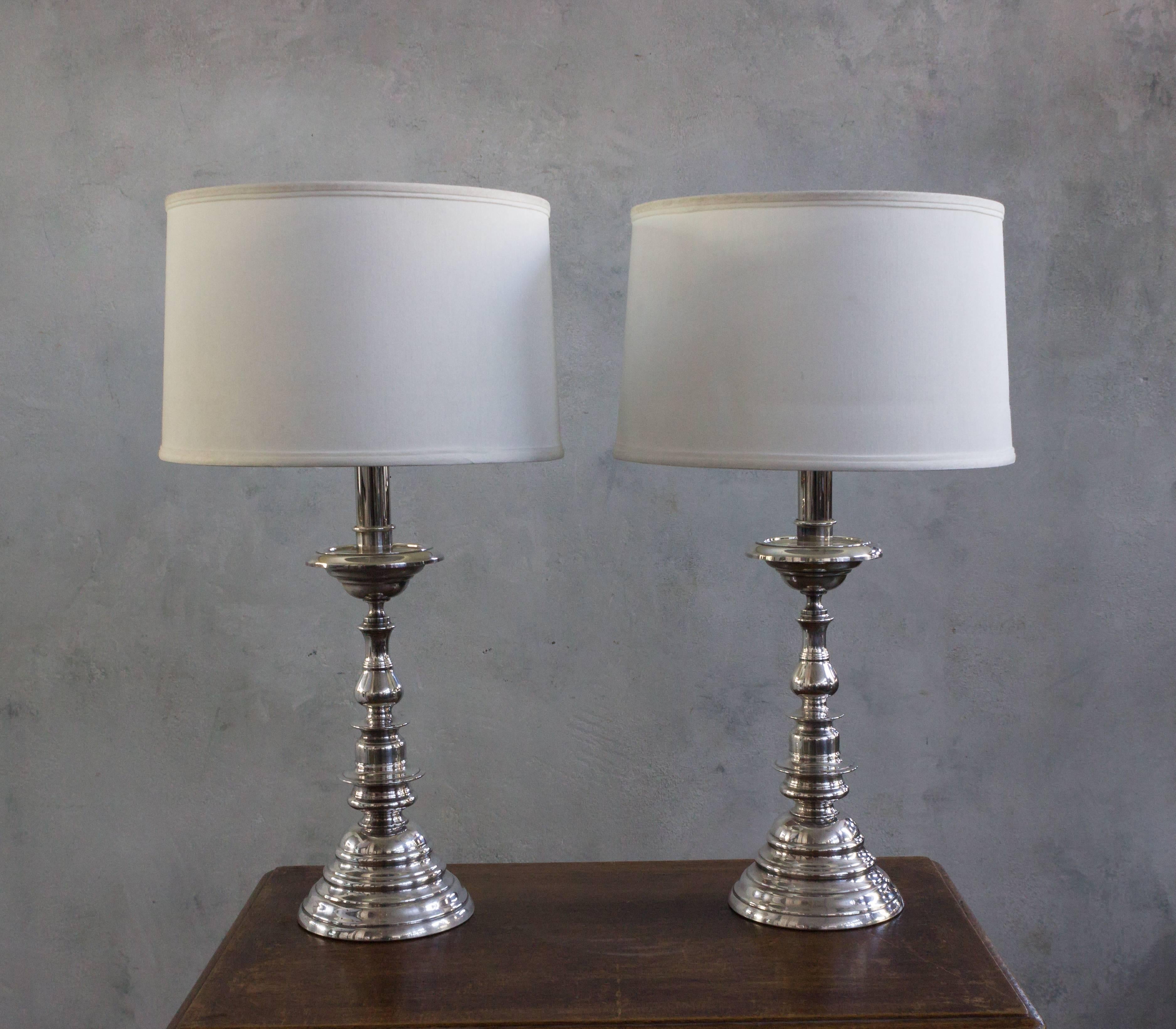 Pair of Spanish silver plated lamps. Recently replated. Wired for showroom display. Shades are not included.