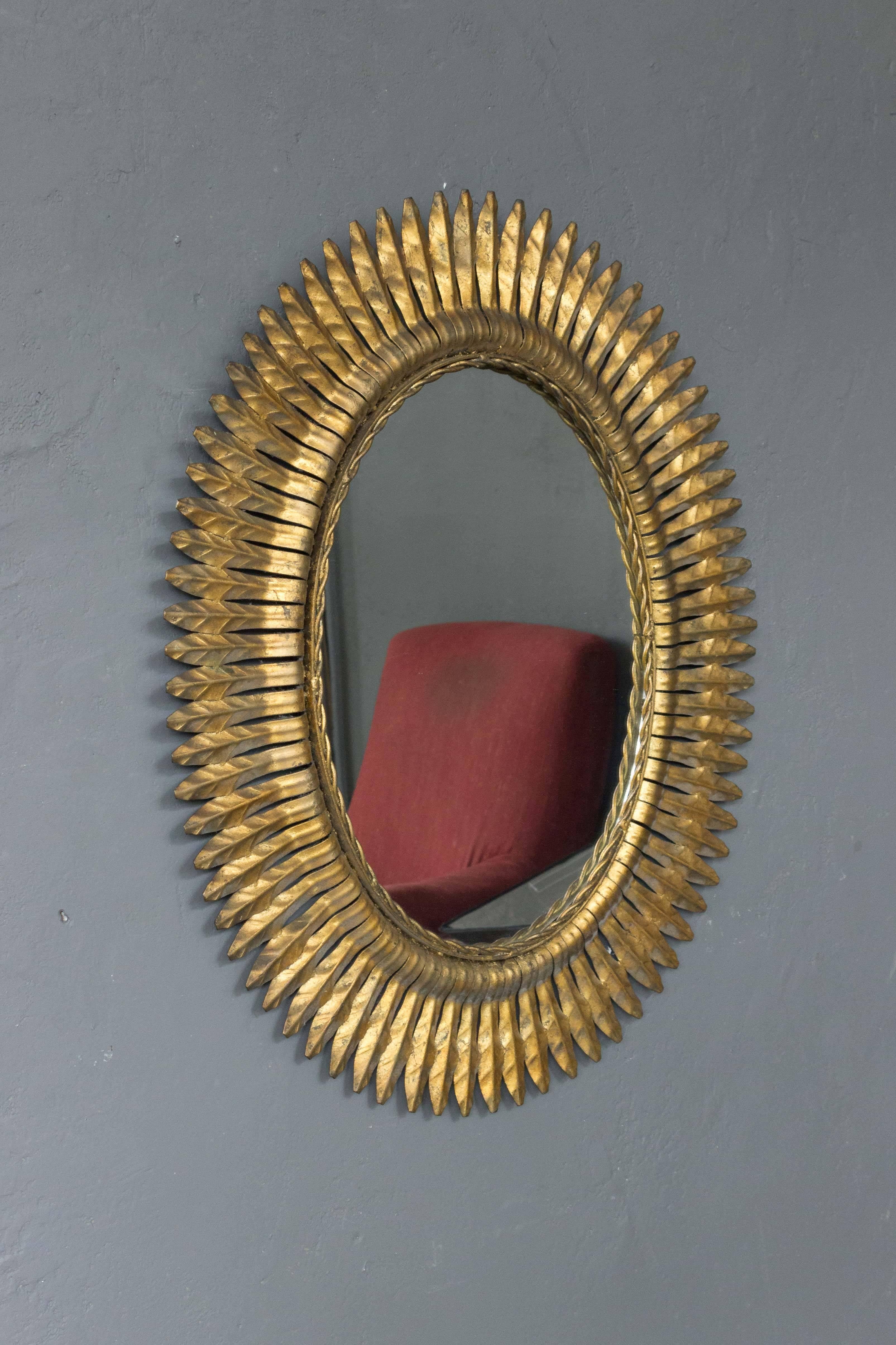 Unusual Pair of Spanish 1940s Gilt Metal Sunburst Mirrors In Good Condition In Buchanan, NY