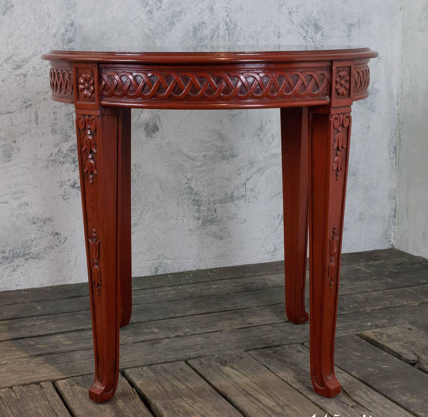 American, 1940s Chinese modern style round end table with antique red finish.