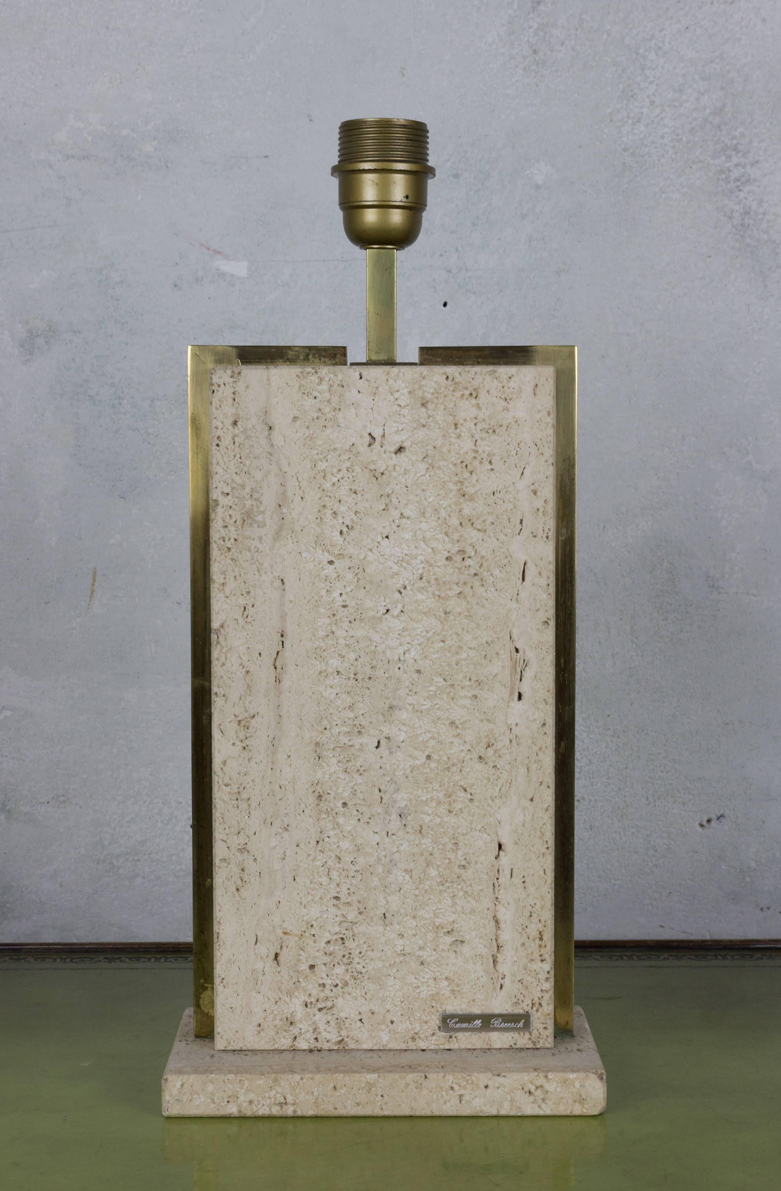 Introducing a Belgian 1970s small rectangular lamp in travertine, expertly framed in brass and signed by the renowned Camille Breesch. This vintage piece, not UL wired but boasting original European wiring, adds a touch of elegance to any space. The
