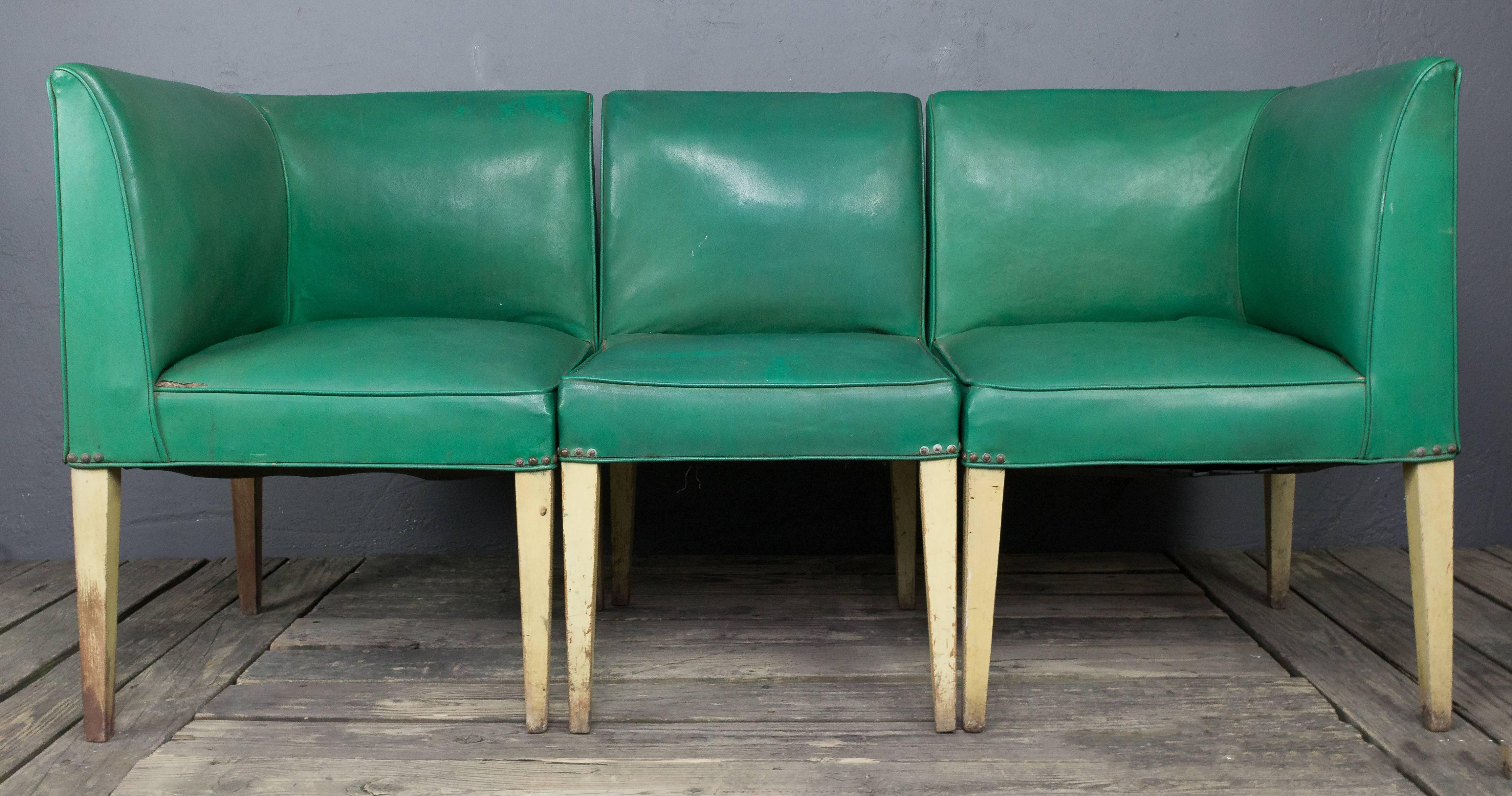American 1940s three-piece green vinyl banquette. A very interesting pieces and once restore will be stunning.  Sold as is.
   