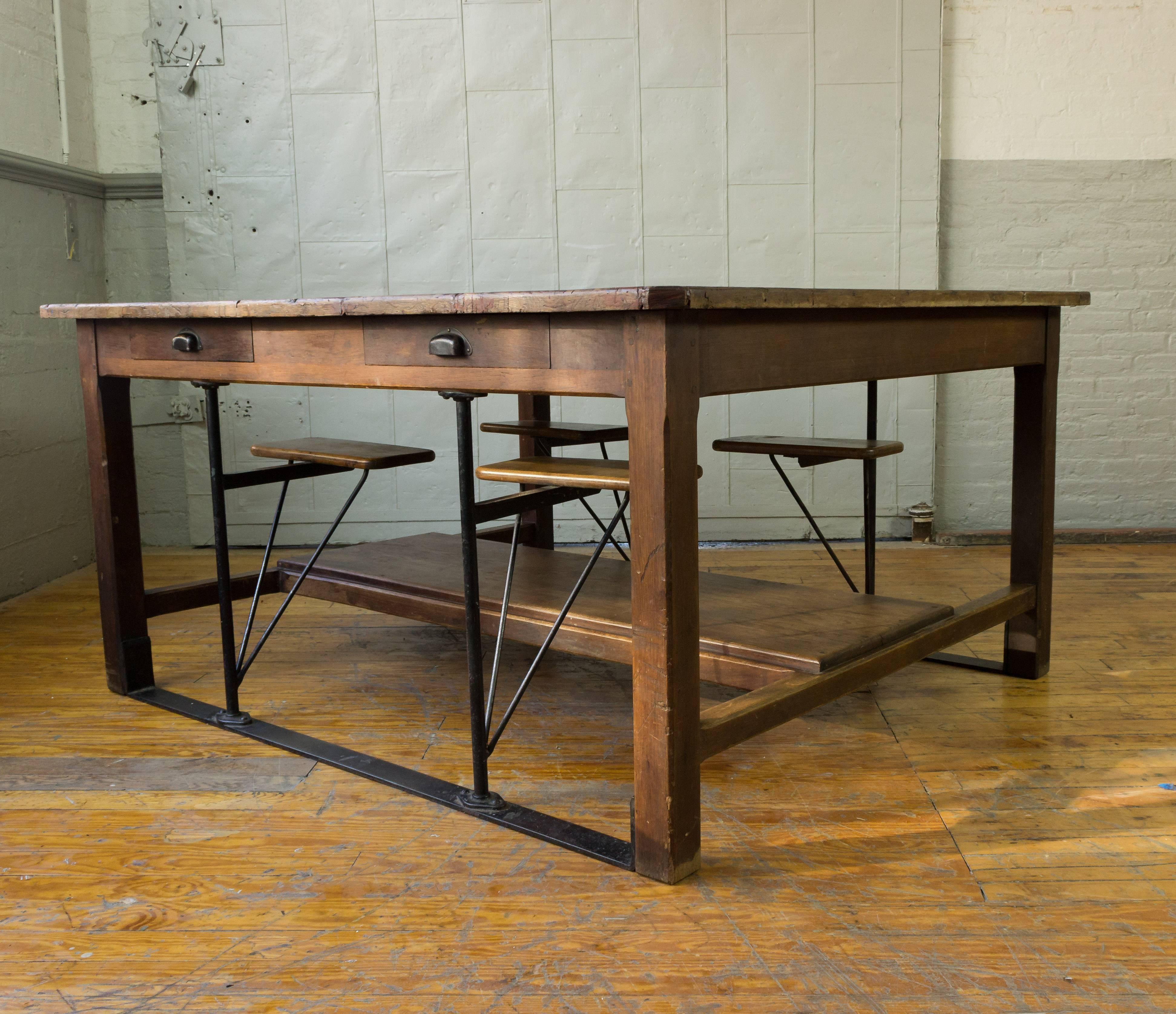 Large French Industrial Table with Swing Out Attached Seats In Distressed Condition In Buchanan, NY
