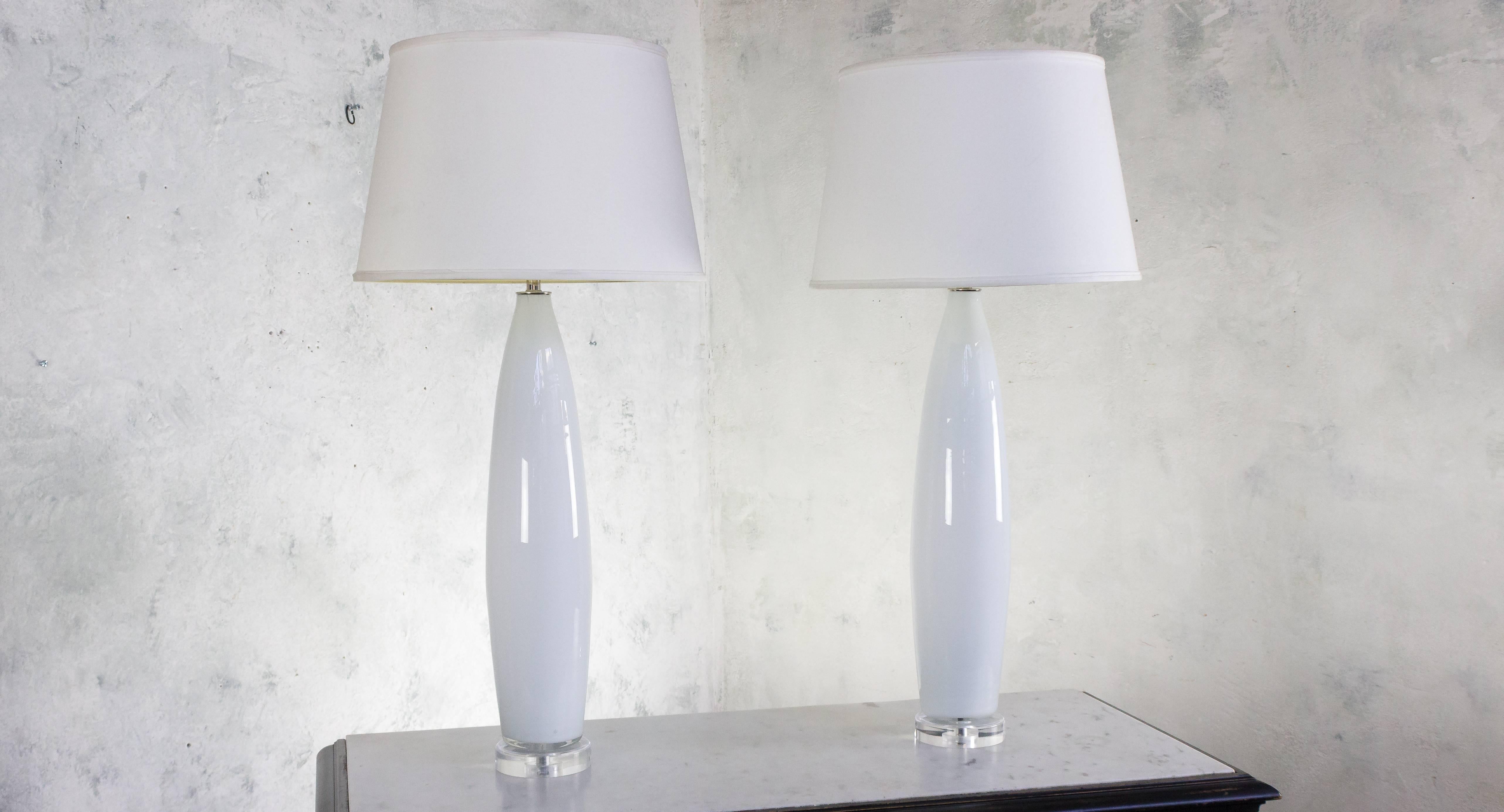 Pair of white case glass Murano lamps on new plexiglass bases.