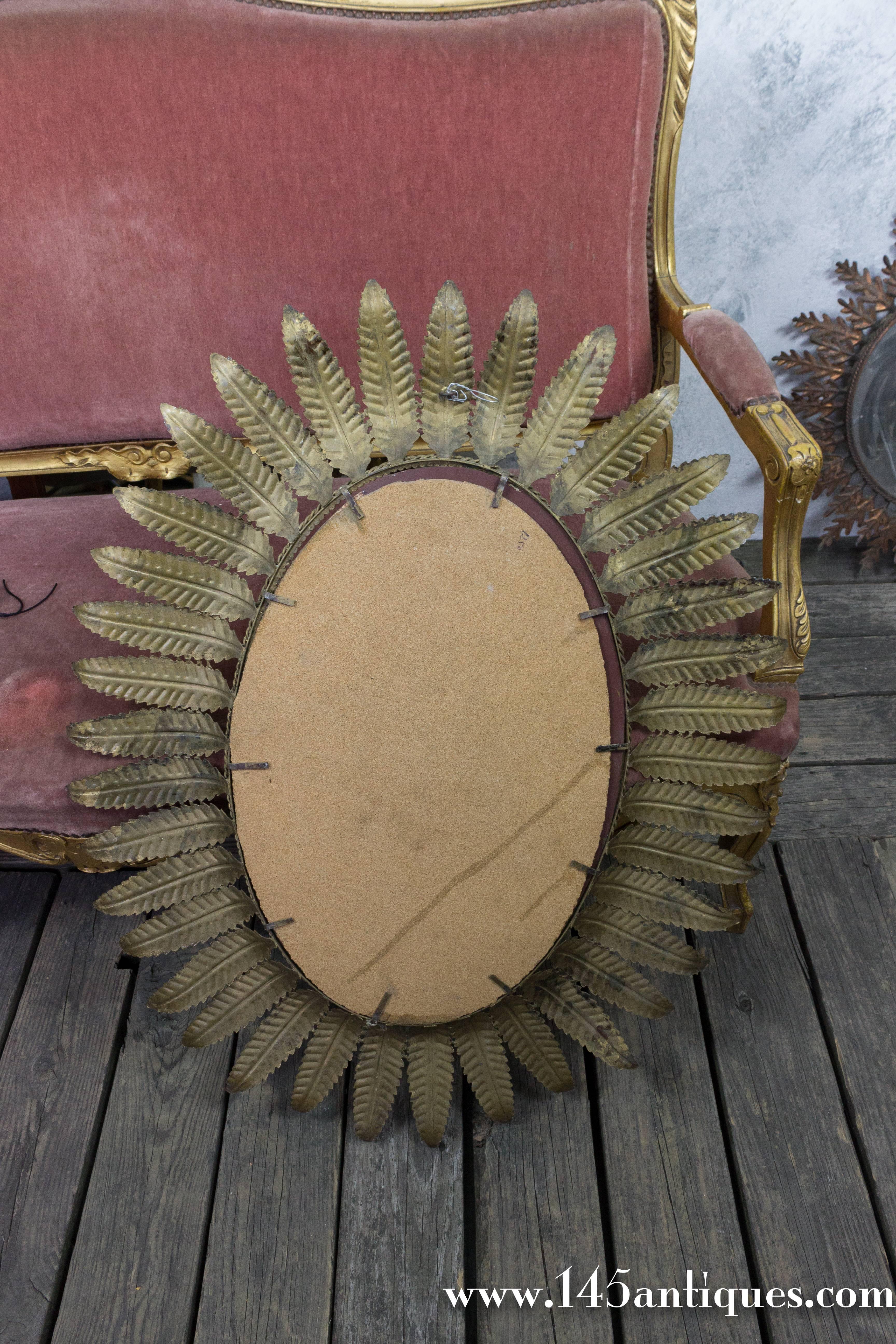 Mid-20th Century Large Oval Gilt Sunburst Mirror