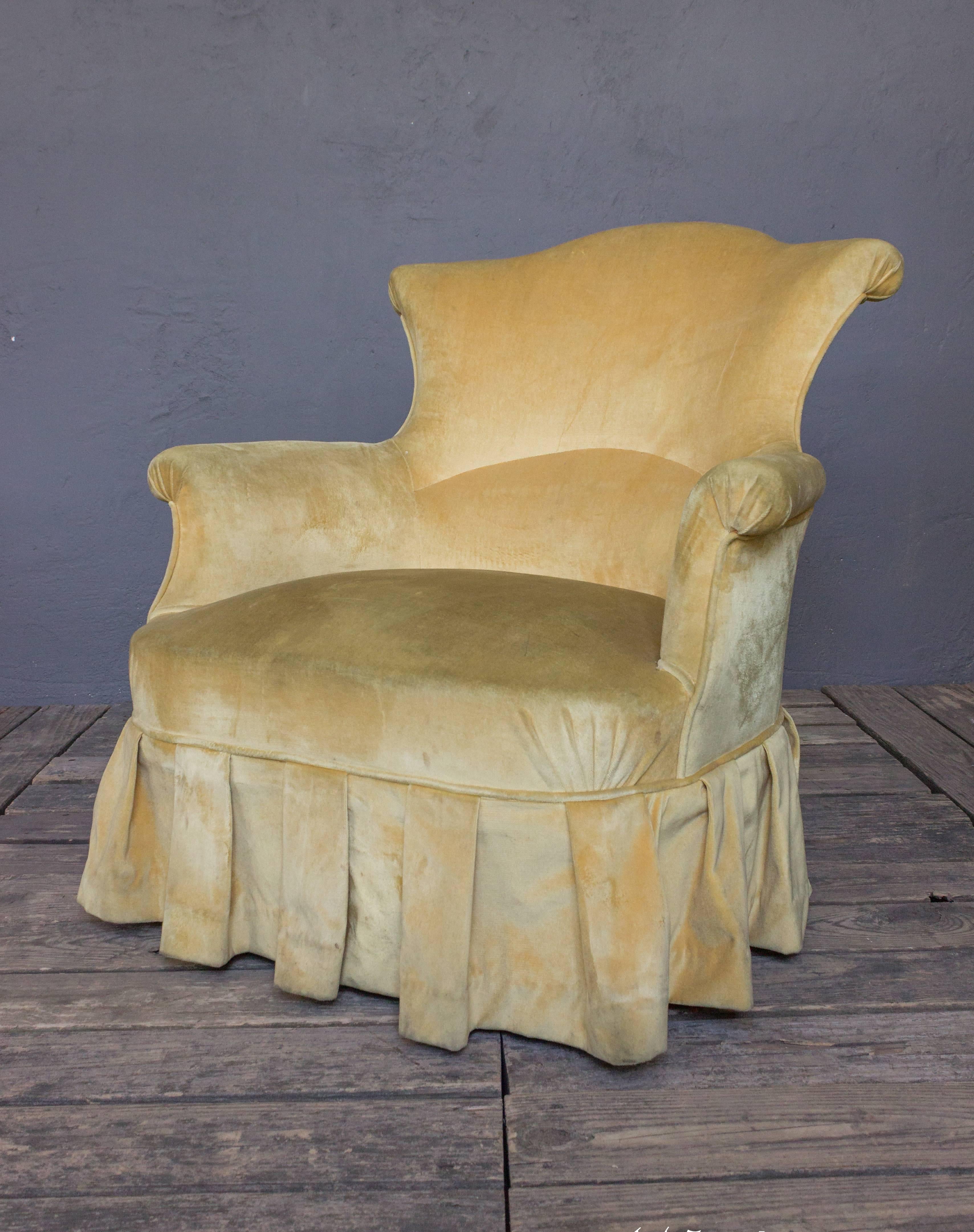 Pair of large-scale Napoleon III armchair in a skirt gold velvet. These pieces have an unusual rolled 