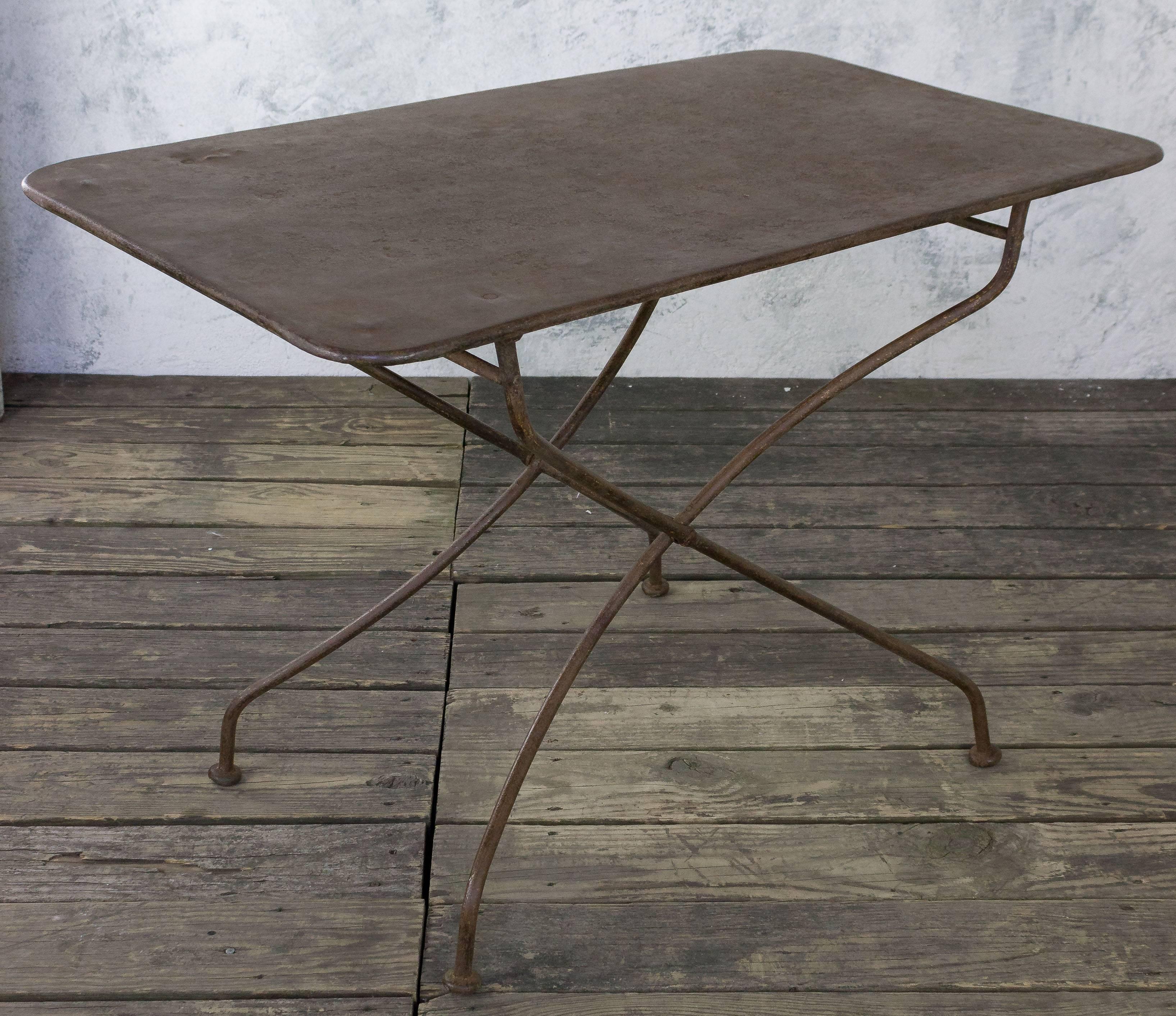 French garden table with nice old patina. The table folds for easy storage. Circa 1920

This price of this item has been reduced. This is the final net price.

 