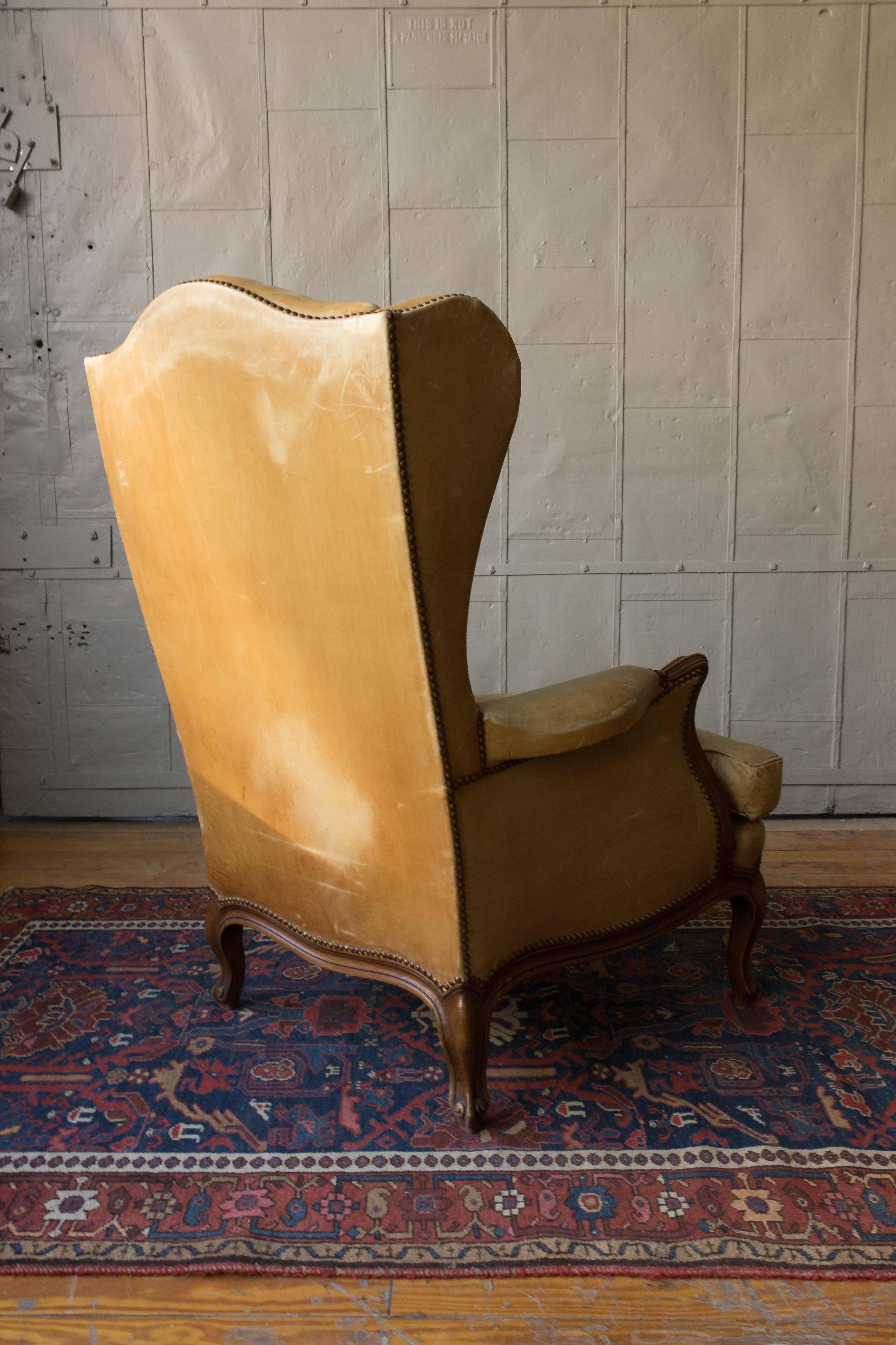 Mid-20th Century Louis XV Style Leather Wingback Armchair