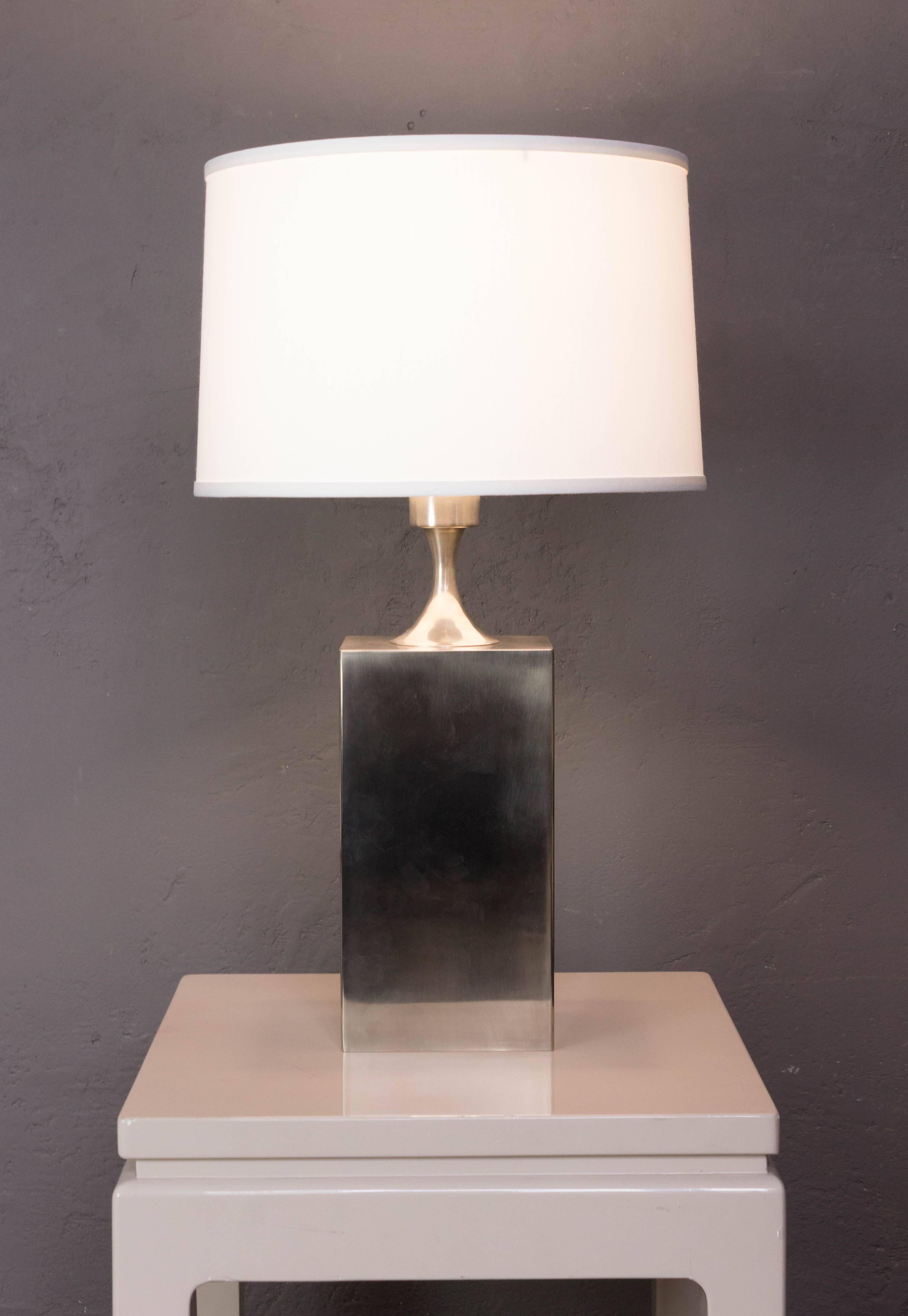 Polished steel lamp designed by Philippe Barbier (French 1970s). 