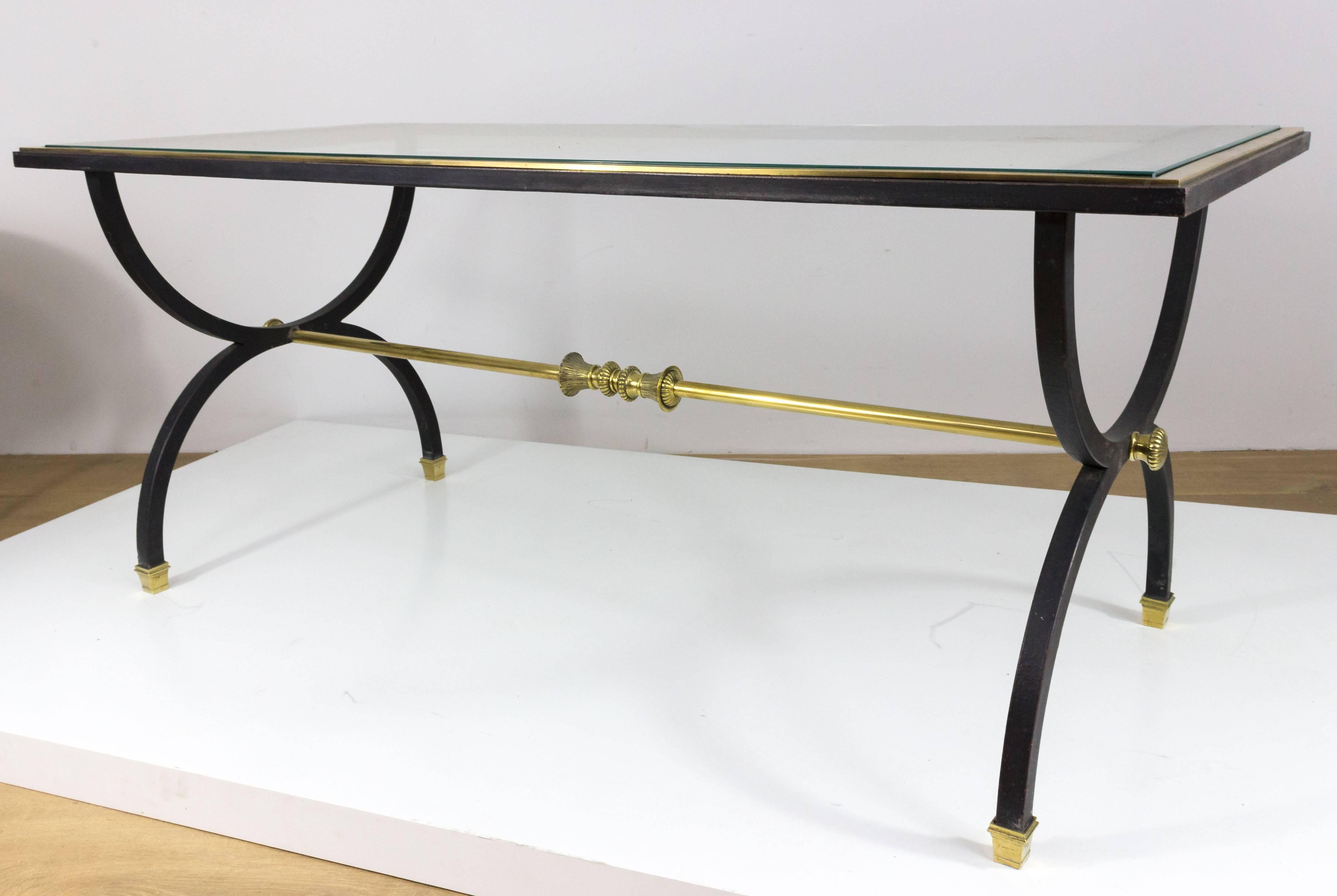 Neoclassical black lacquered steel coffee table with brass and bronze ornaments, 1950s.

This coffee table is currently in France, please allow us 4 to 6 weeks for delivery.