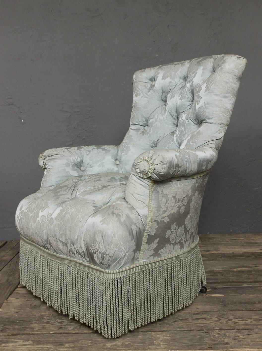 Fabric French 19th Century Tufted Armchair and Ottoman For Sale