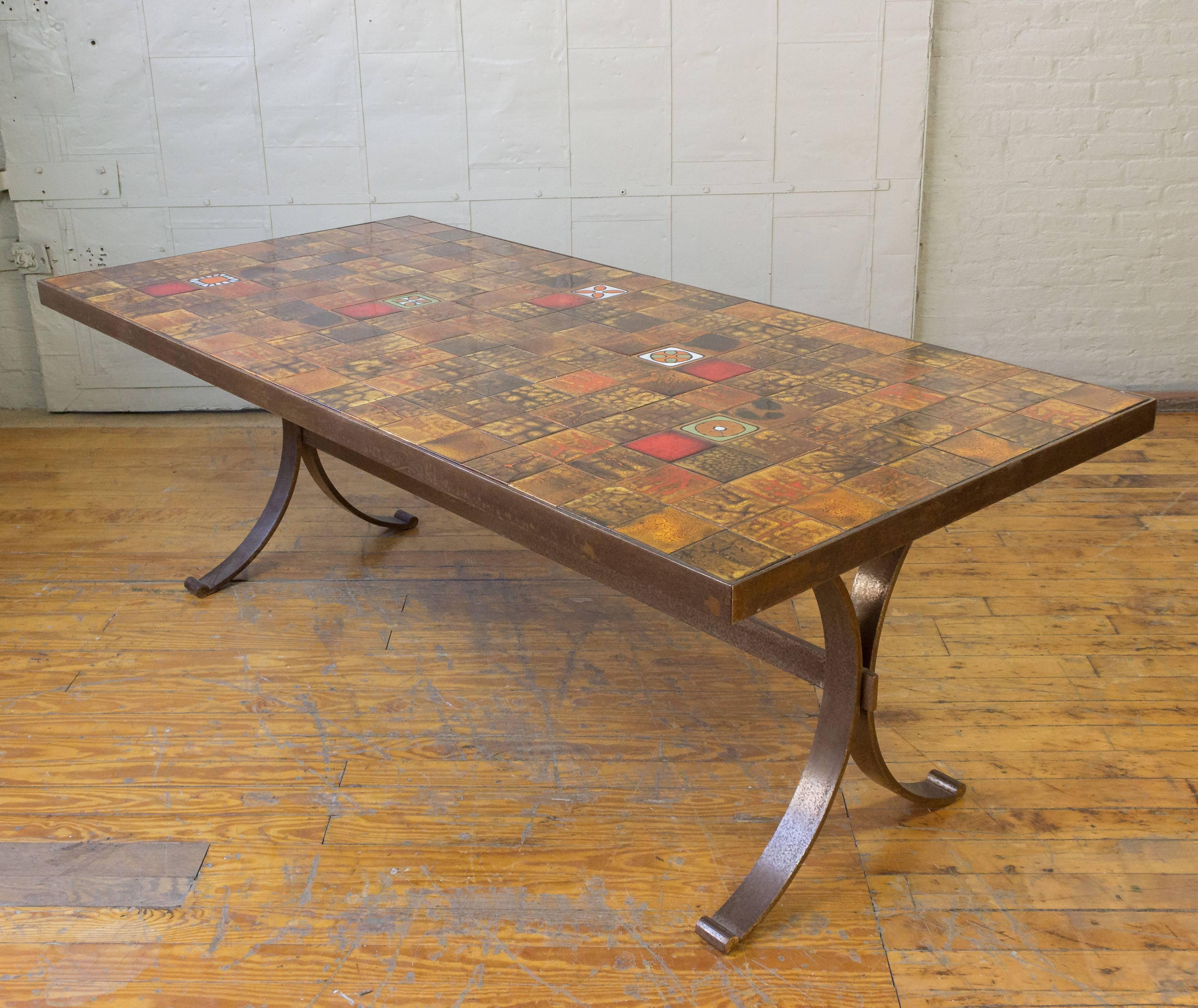 French 1960s dining table with Valoris ceramic tiles on an iron base.

