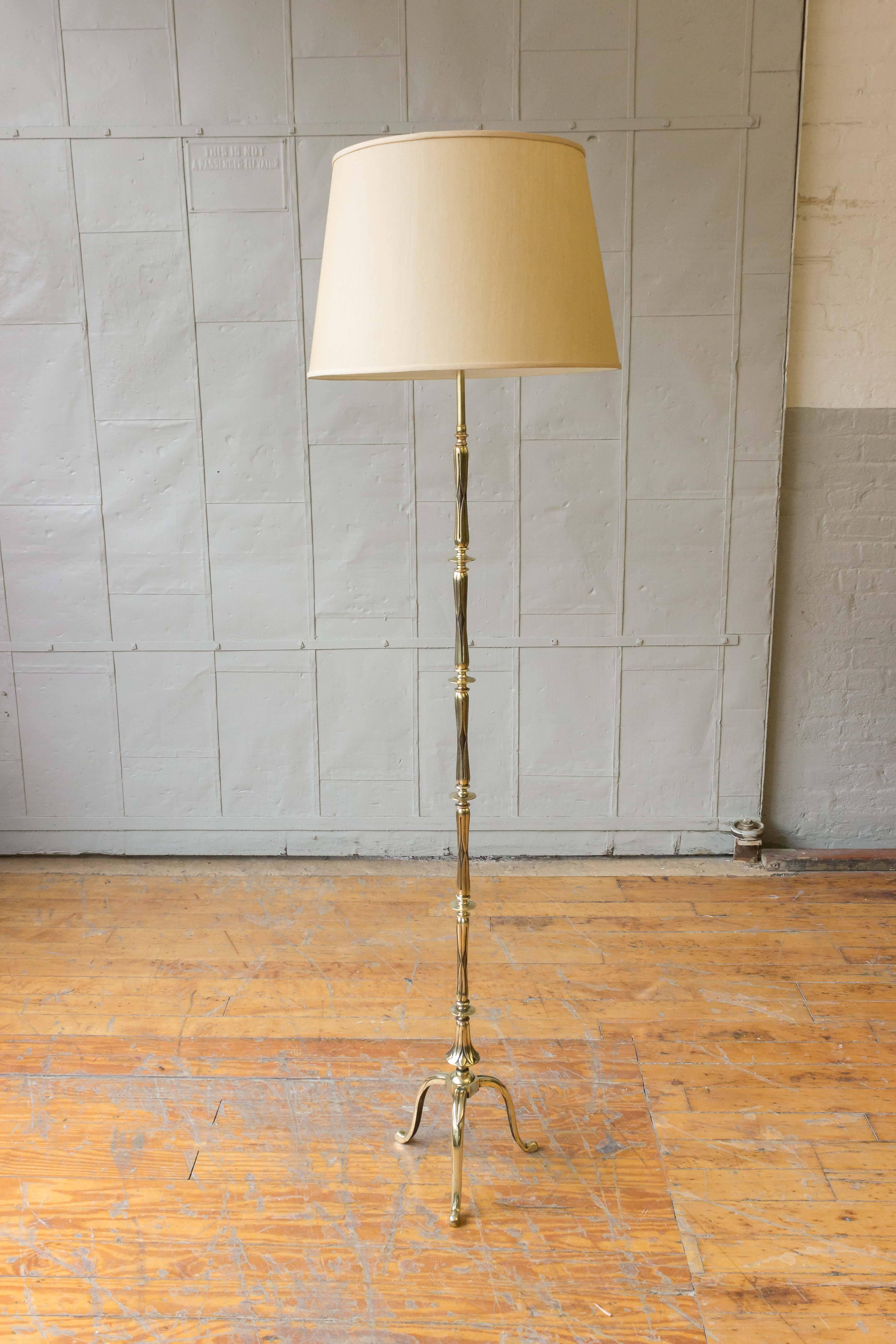 Pair of French bronze Art Deco style floor lamps with intricate detailed stem and base. The floor lamps have recently been rewired and polished . Quote for professional UL code wiring is available on request. 

Not sold with shades.