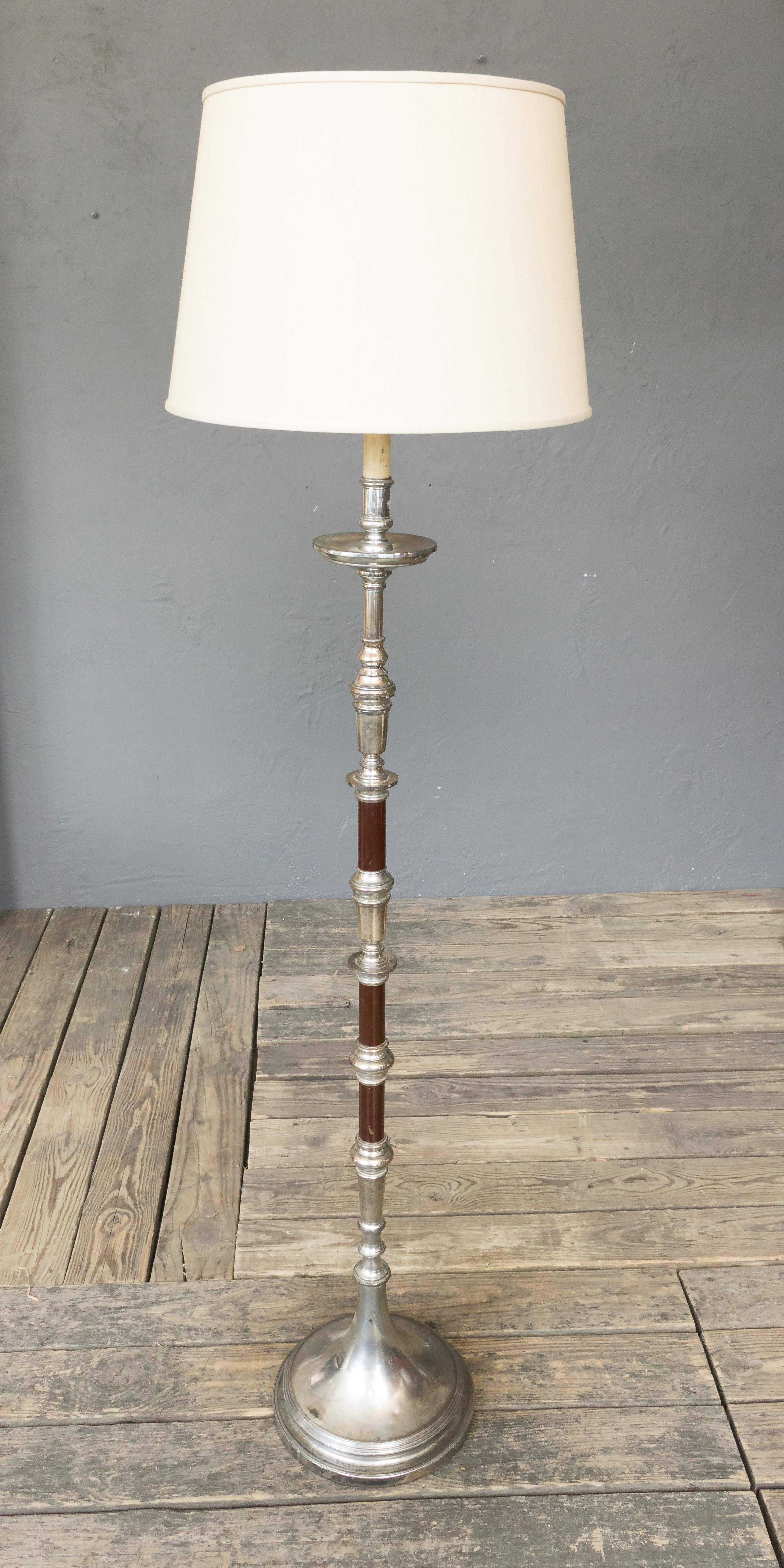 Interesting floor lamp with nickel-plated and painted burgundy color components. French, 1970s
Not sold with lampshade.
This lamp can be re-plated in either nickel, silver or brass. Pricing on request.