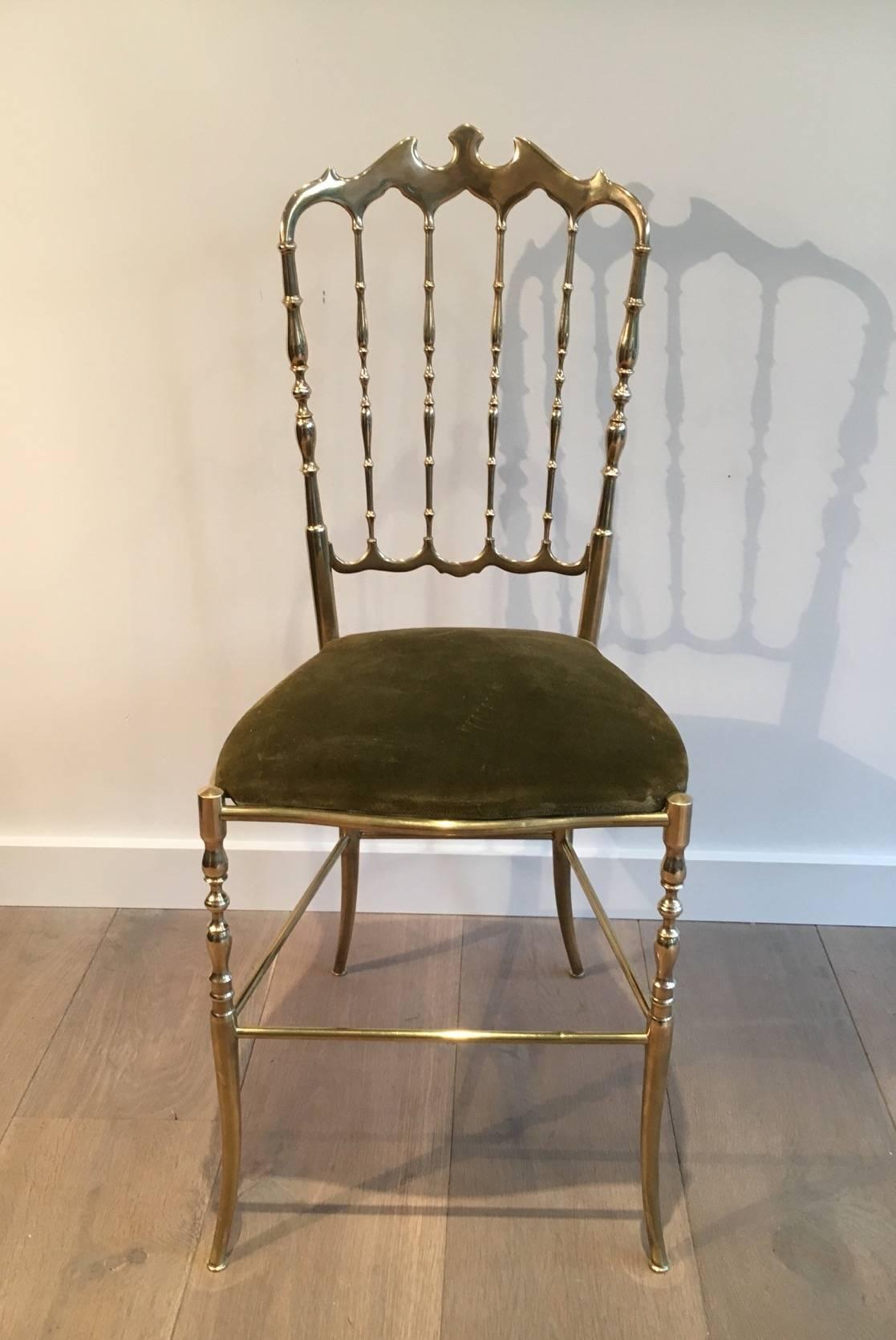 A solid brass side chair designed by Charivari brass with an upholstered seating green velvet, French, circa 1940

This chair is currently in France, please allow 4 to 6 weeks for delivery.