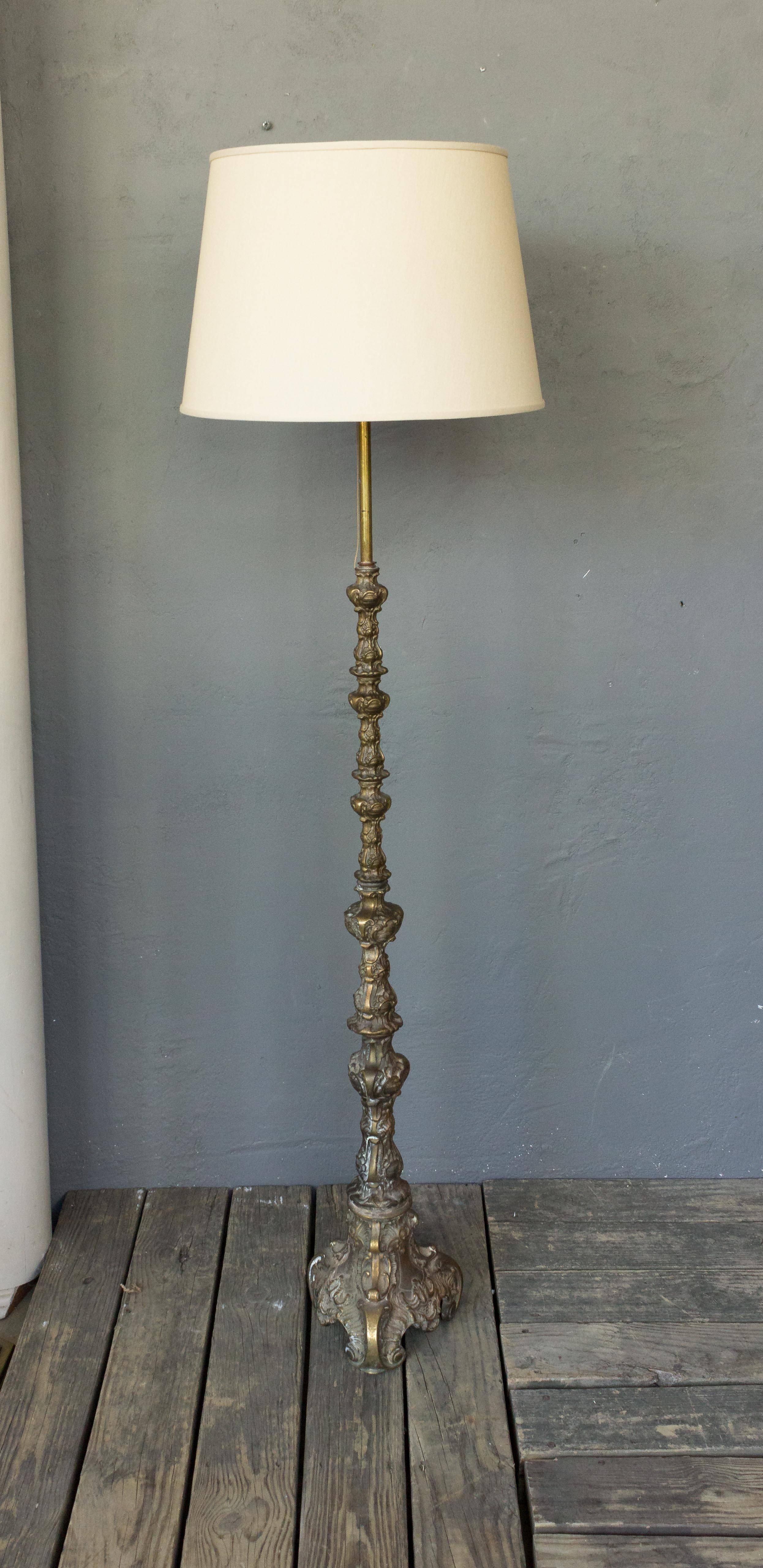 A ornate and  well made bronze and brass floor lamp

Price includes polishing or plating and new wiring. Please allow 2 to 3 weeks for completion. Not sold with shade.

