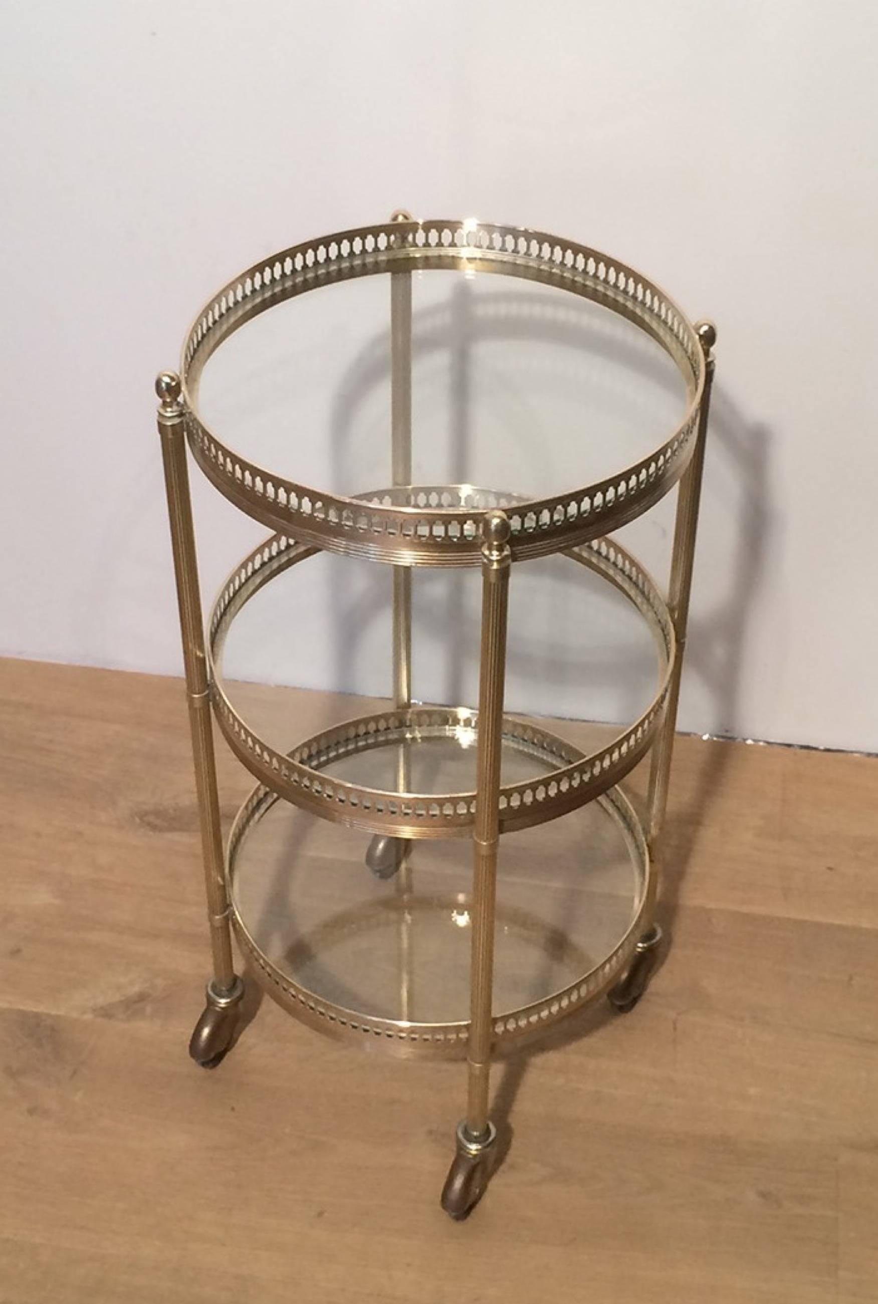 Neoclassical Small Round Brass Three-Tiered Table on Casters by Maison Jansen