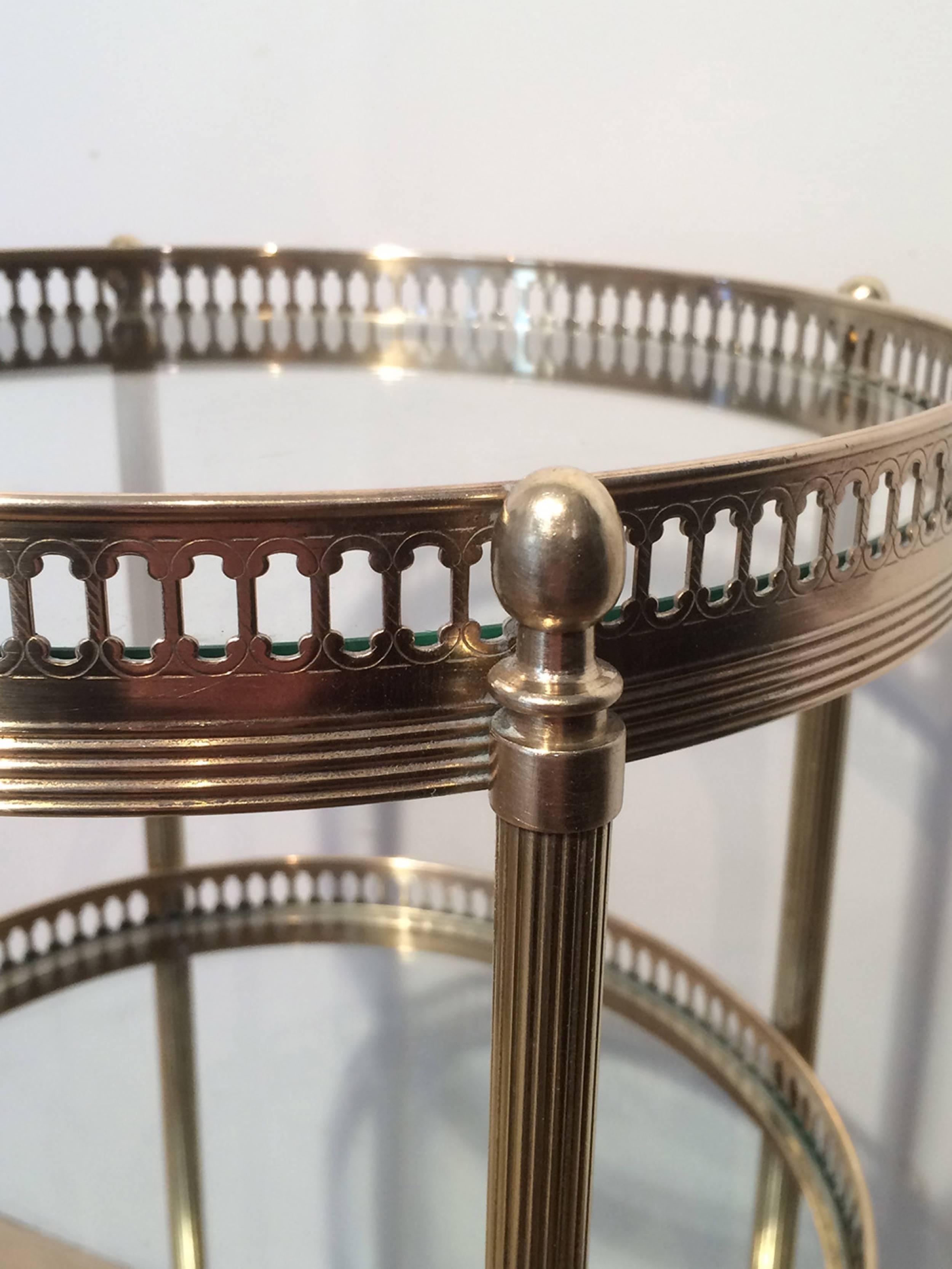 Mid-20th Century Small Round Brass Three-Tiered Table on Casters by Maison Jansen