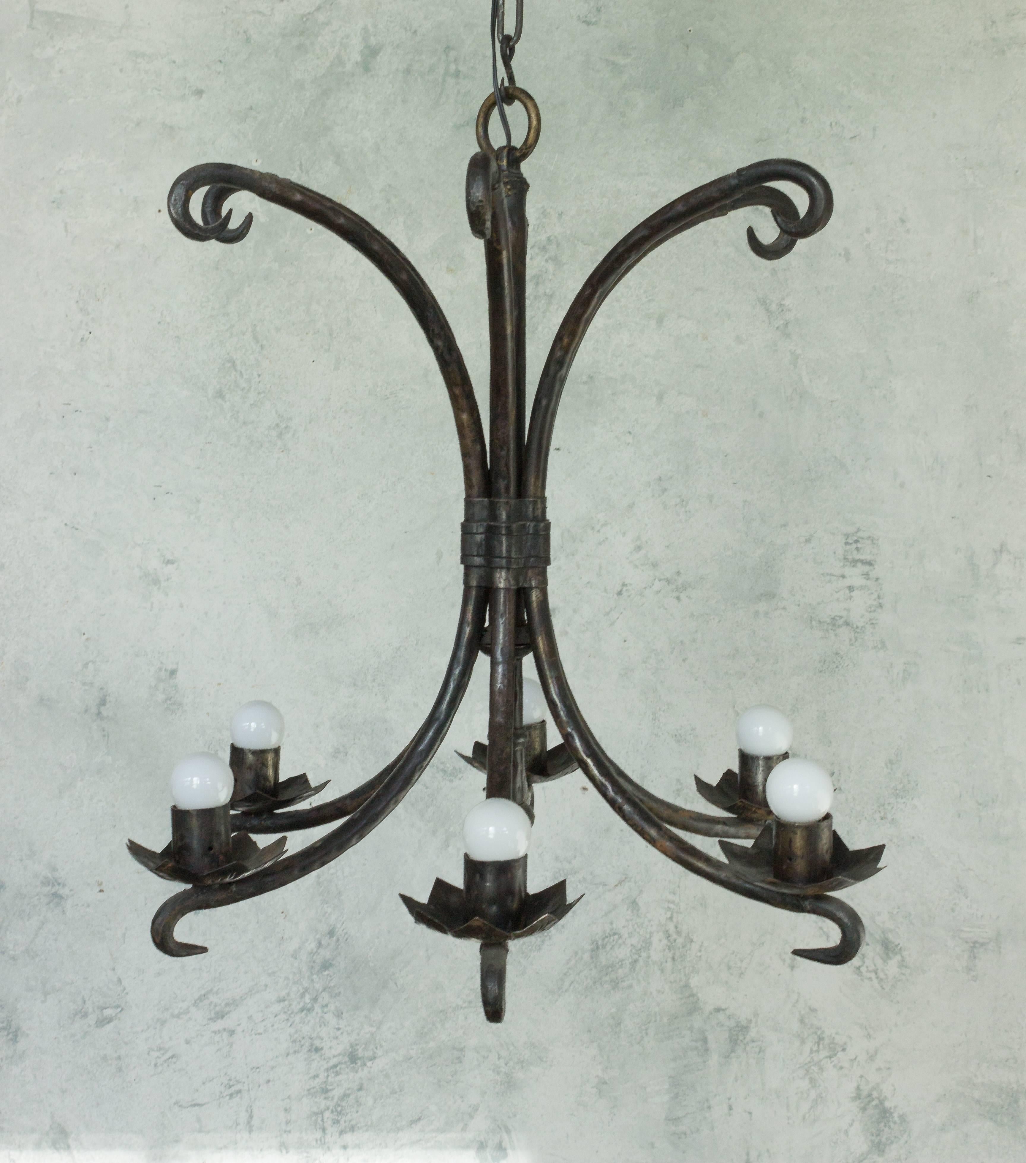 Spanish wrought iron chandelier with black waxed finish, six lights.

Ref #: LC0506-02

Dimensions: 30”H x 28”Diameter

SALE PRICE IS VALID UNTIL 01/18/2022. ( SALE PRICE IS FINAL NET PRICE )