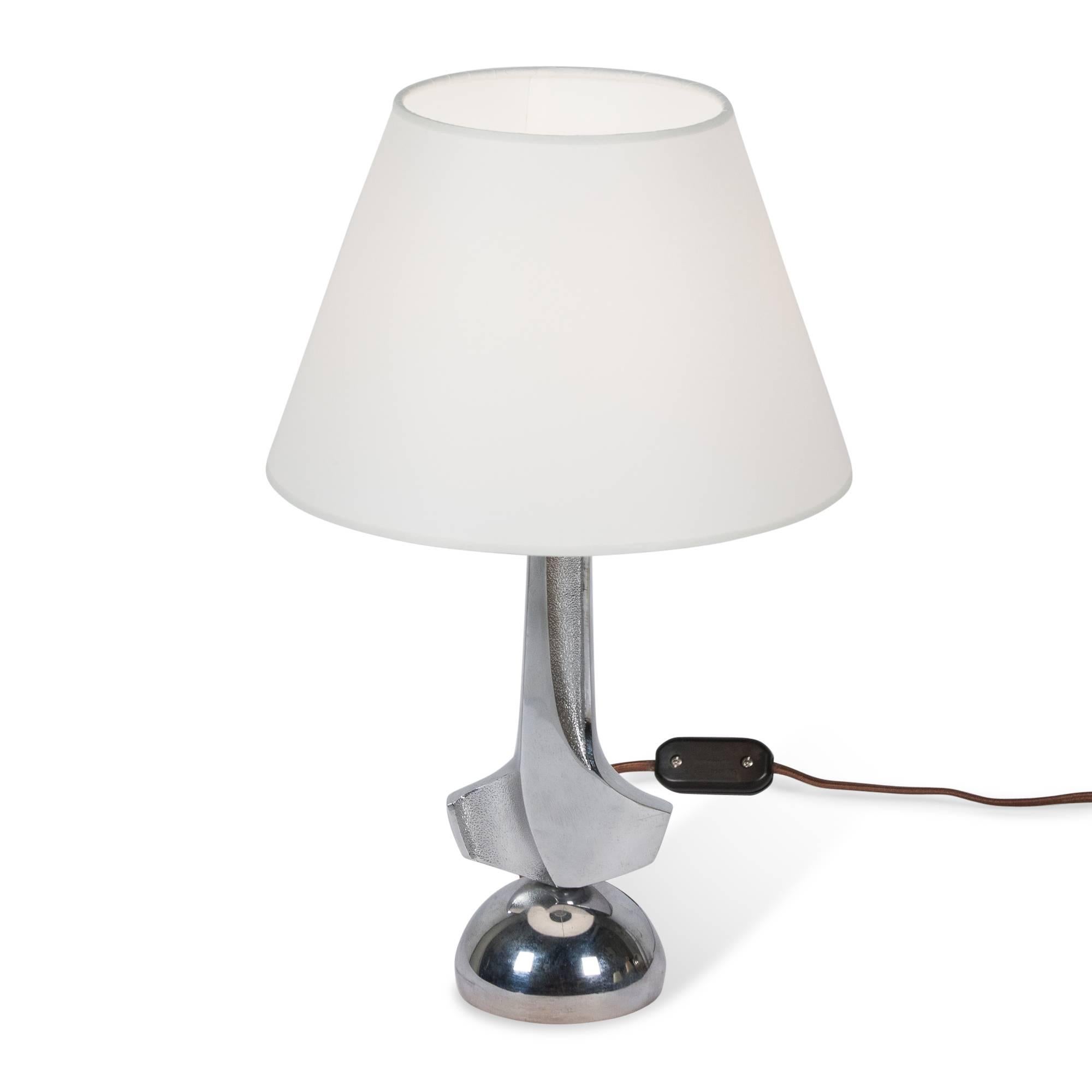 Chrome streamline style table lamp, tapered column with on a dome base, Italian 1930s. Measures: 4 in. D base, 14 in. H, 9 in. D shade at widest. 