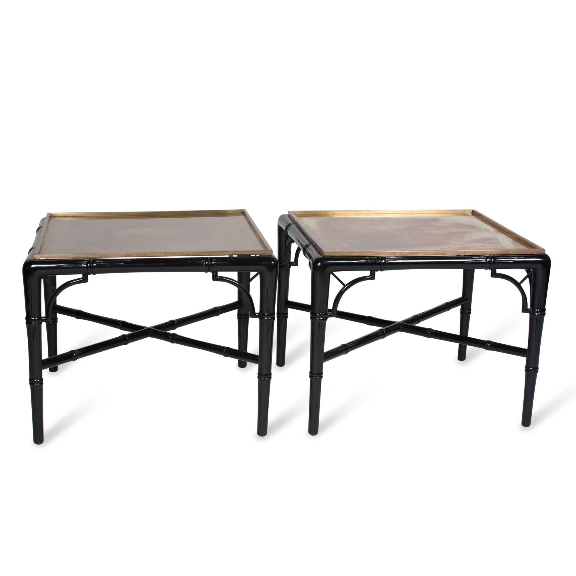 Pair of square end tables with bronze trays set into faux bamboo black lacquer bases, X-stretcher by Billy Haines, American, circa 1940. Measures: 19 1/2 in square, height 15 3/4 in.