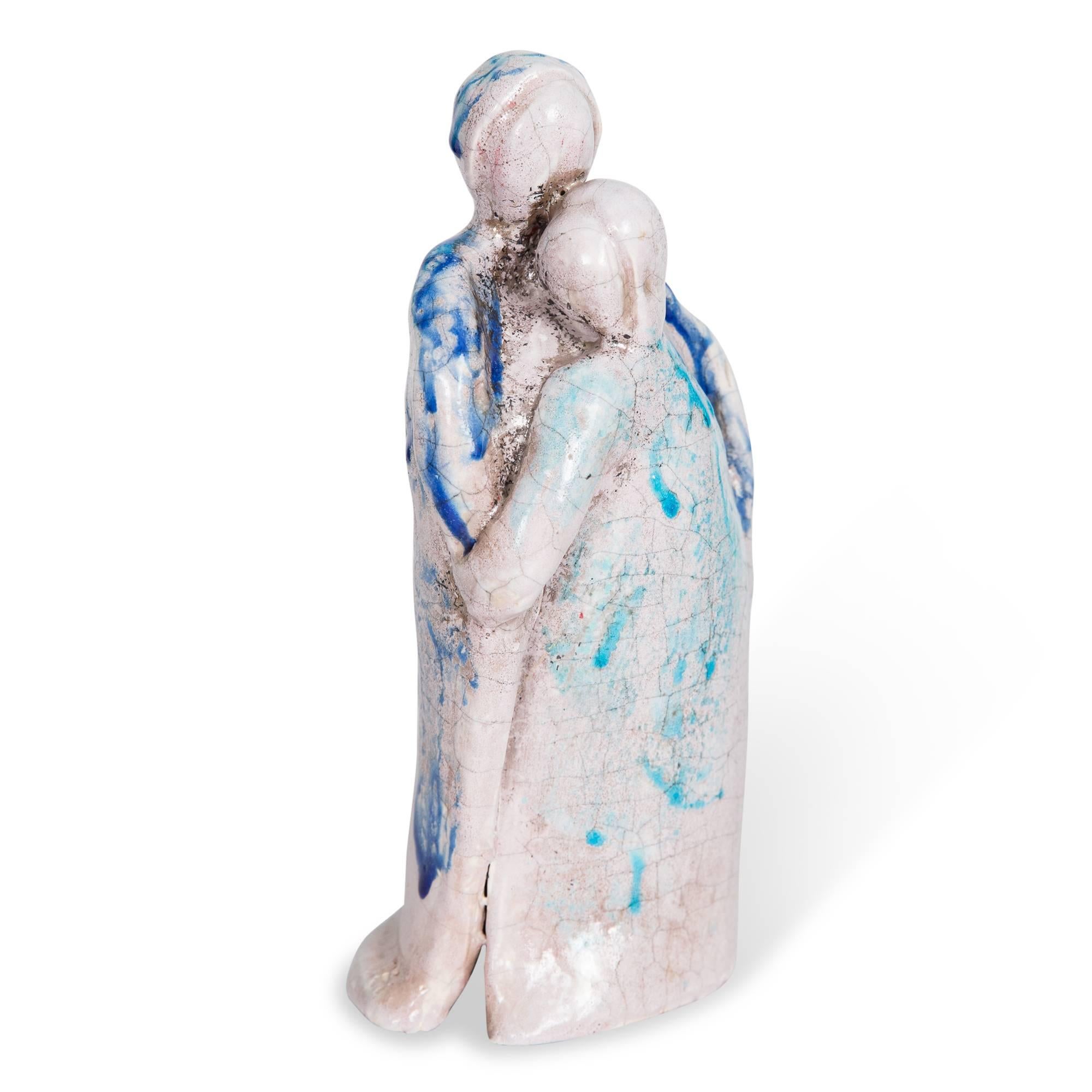 Glazed ceramic figure, robed mother and child, Italy, 1930s. Measures: Height 11 in, width 6 in, depth 4 in. 

Note: Some cracking and separation at base, likely in the firing. See photos.