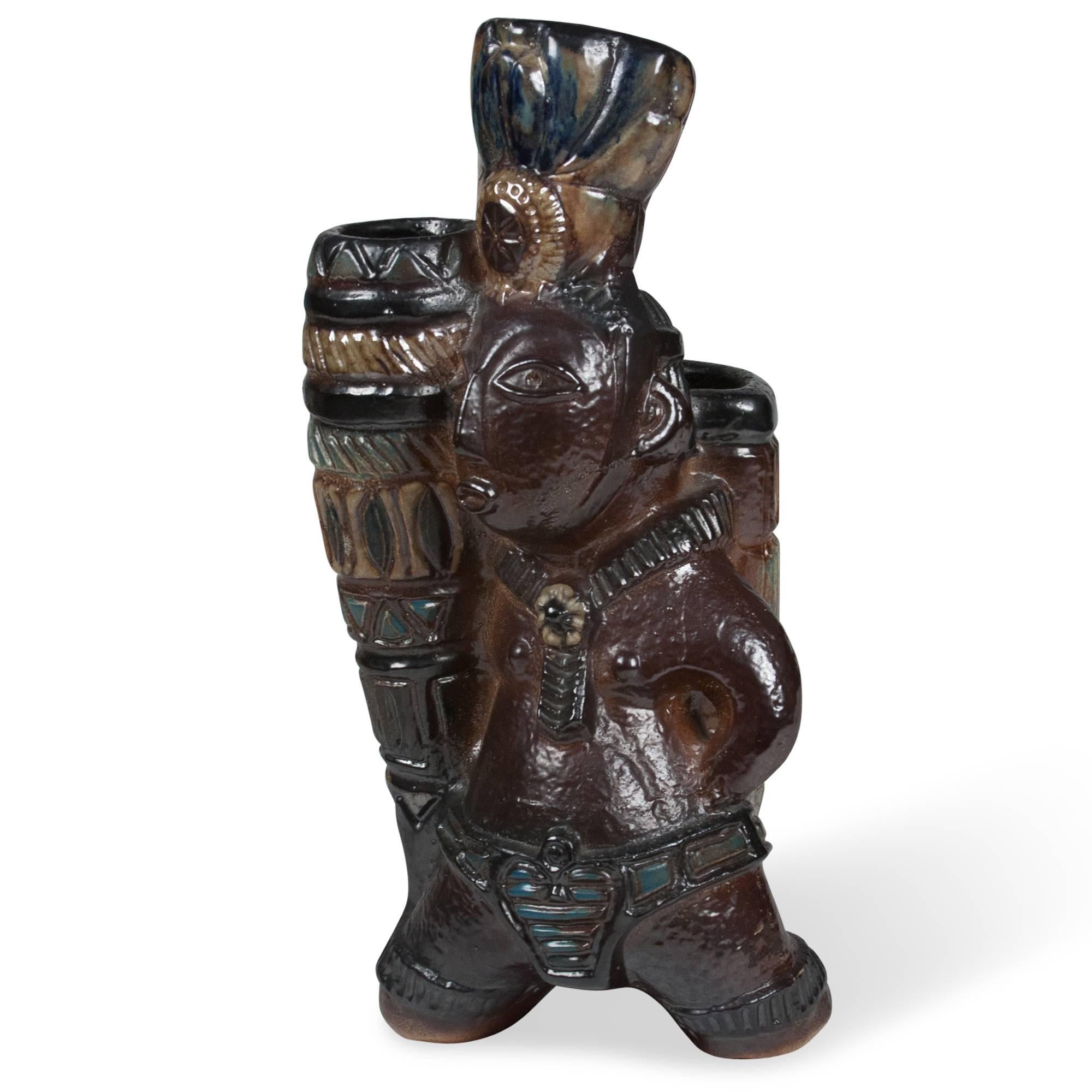 Glazed earthenware vase in the form of a tribal figure, by Colette Gueden for Primavera, France, 1930s. Signed. Measures: 4 3/4 in. height, 7 1/2 in. width, 6 1/2 in. depth. 