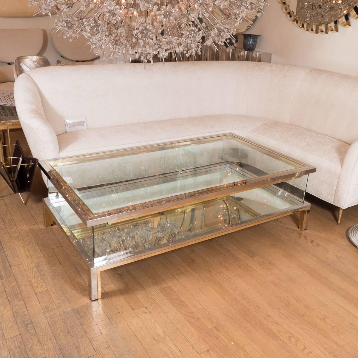 Rectangular brass, nickel and glass coffee table with sliding glass top by Willy Rizzo.