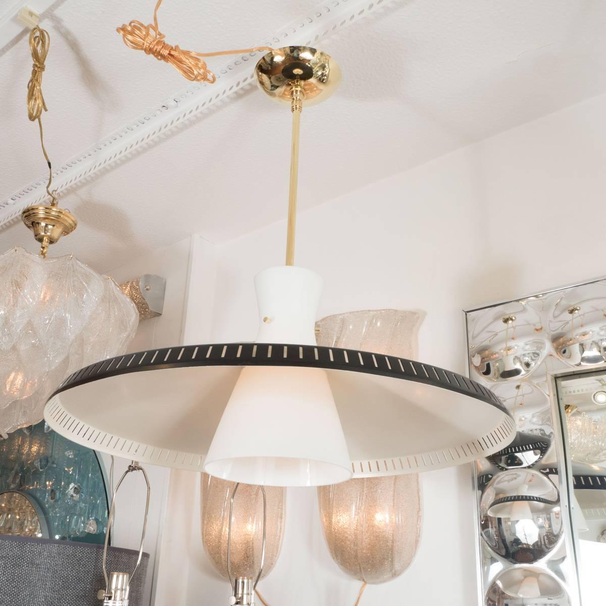 Brass pendant with enameled metal shade and frosted Murano glass core by Stilnovo. Signed.