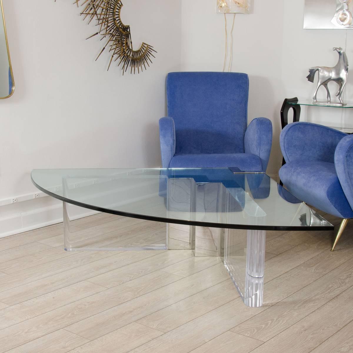 Wedge form Lucite and glass coffee table with chrome details 
