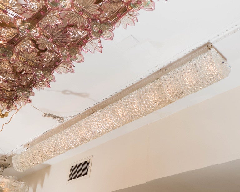 Slender and long textured glass flush mount ceiling fixture by Barovier.