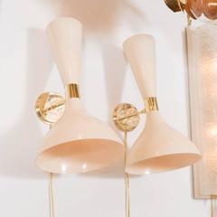 Pair of Articulated "Trumpet" Sconces