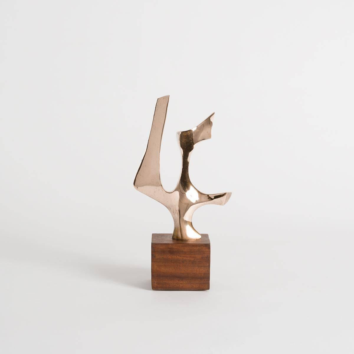 A piece in bronze, elevated on a square wooden pedestal, by Fred Brouard, illustrious and groundbreaking French sculpture and furniture maker of the mid to late 20th century.

Numbered: 3/8
Inscribed: F BROUARD.