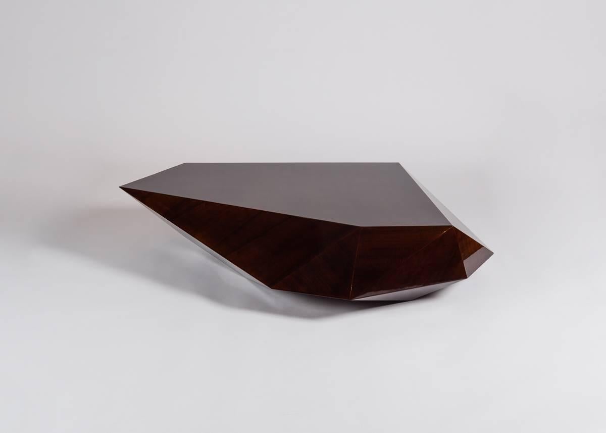 Pietra, which means “rock” in Italian, is a table of stained lauro, has the appearance of a naturally occurring angular geological formation. By Rome based architect Achille Salvagni, recognized worldwide for bringing together Italian craftsmanship