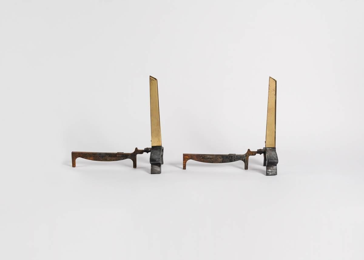 Pair of andirons from the 1950s by American Industrial designer Donald Deskey.

Stamped: Bennett.