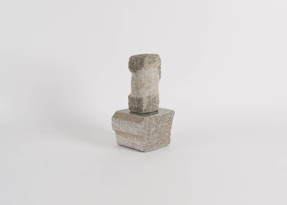 Two pieces of granite, a sculpture by Korean-American artist Yongjin Han.