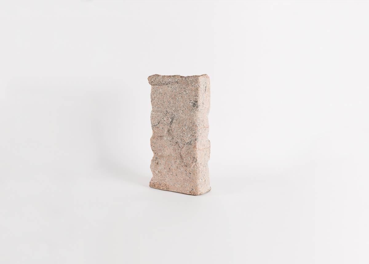 A piece of stone, a sculpture by Korean-American artist Yongjin Han.