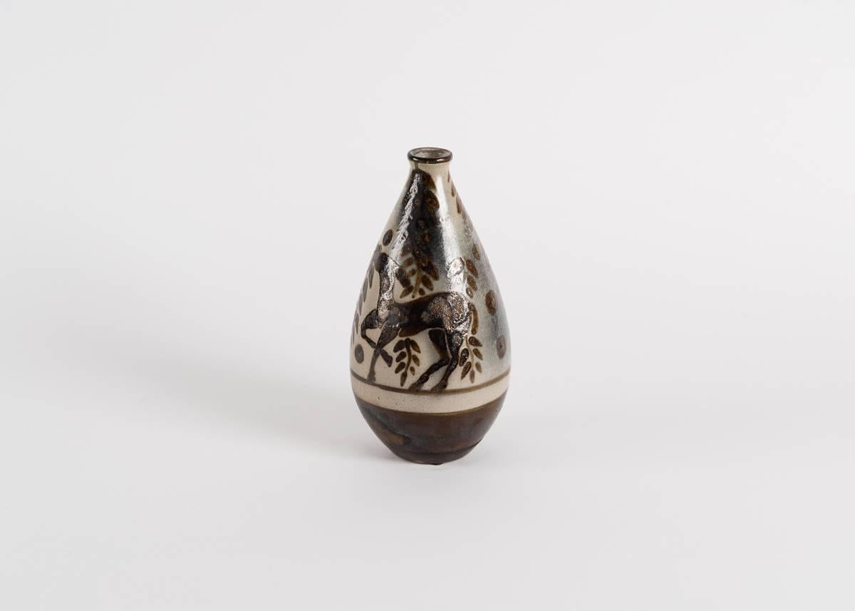 Glazed ceramic vase by Primavera

Stamped: Atelier Primavera Au Printemps.